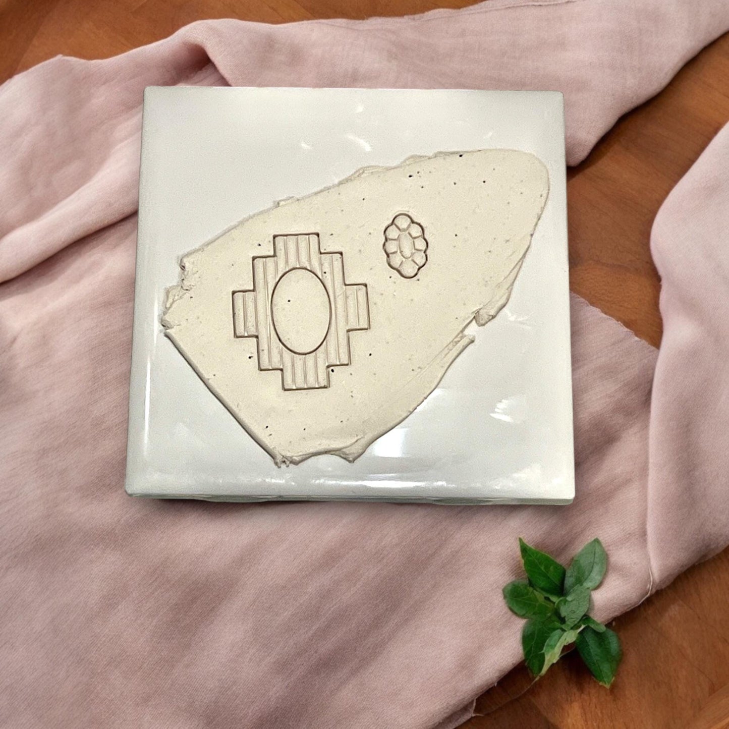 Layered tribal-style cutter with floral embossed detail