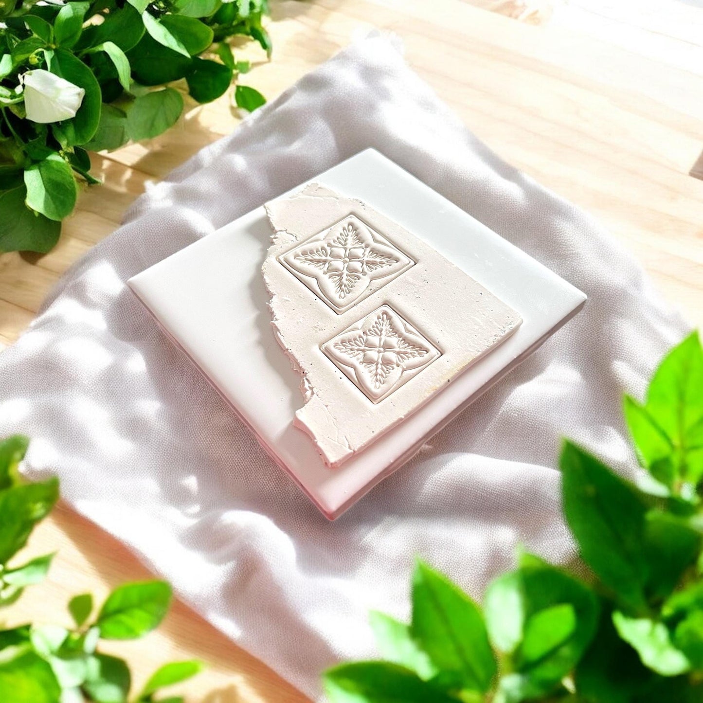 beige clay slab with two floral square impressions