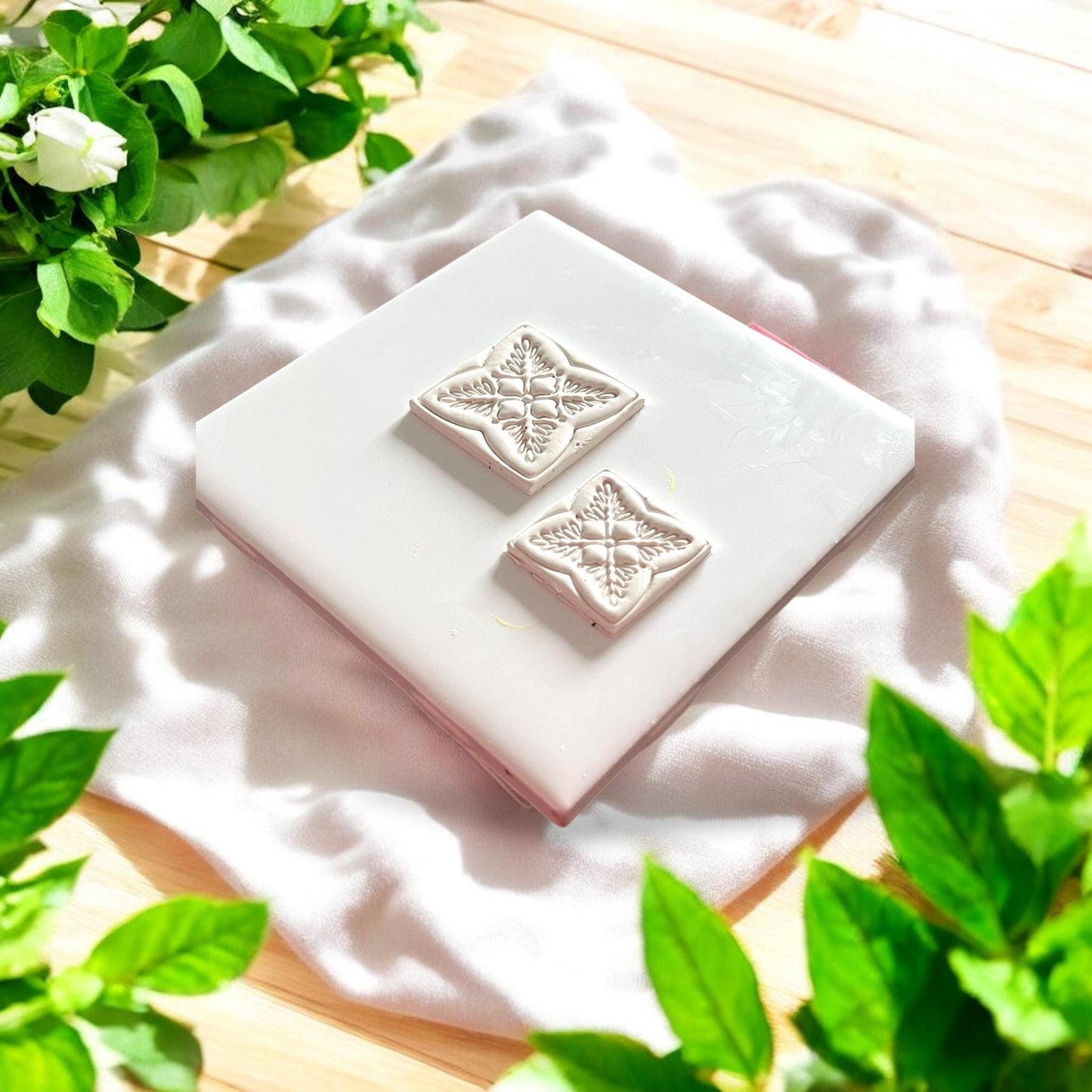 square embossed floral tiles on display