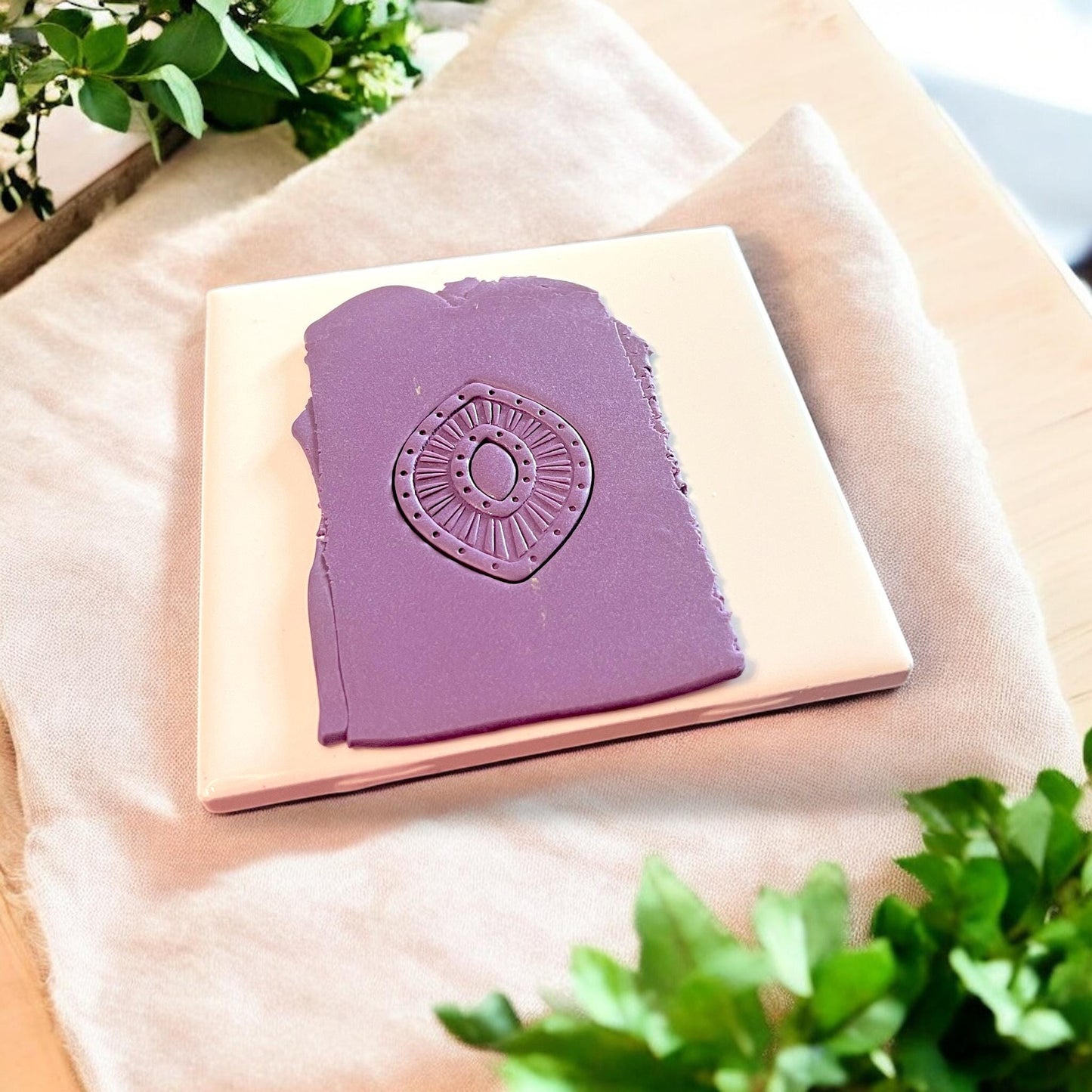 boho eye cutter pressed in purple clay