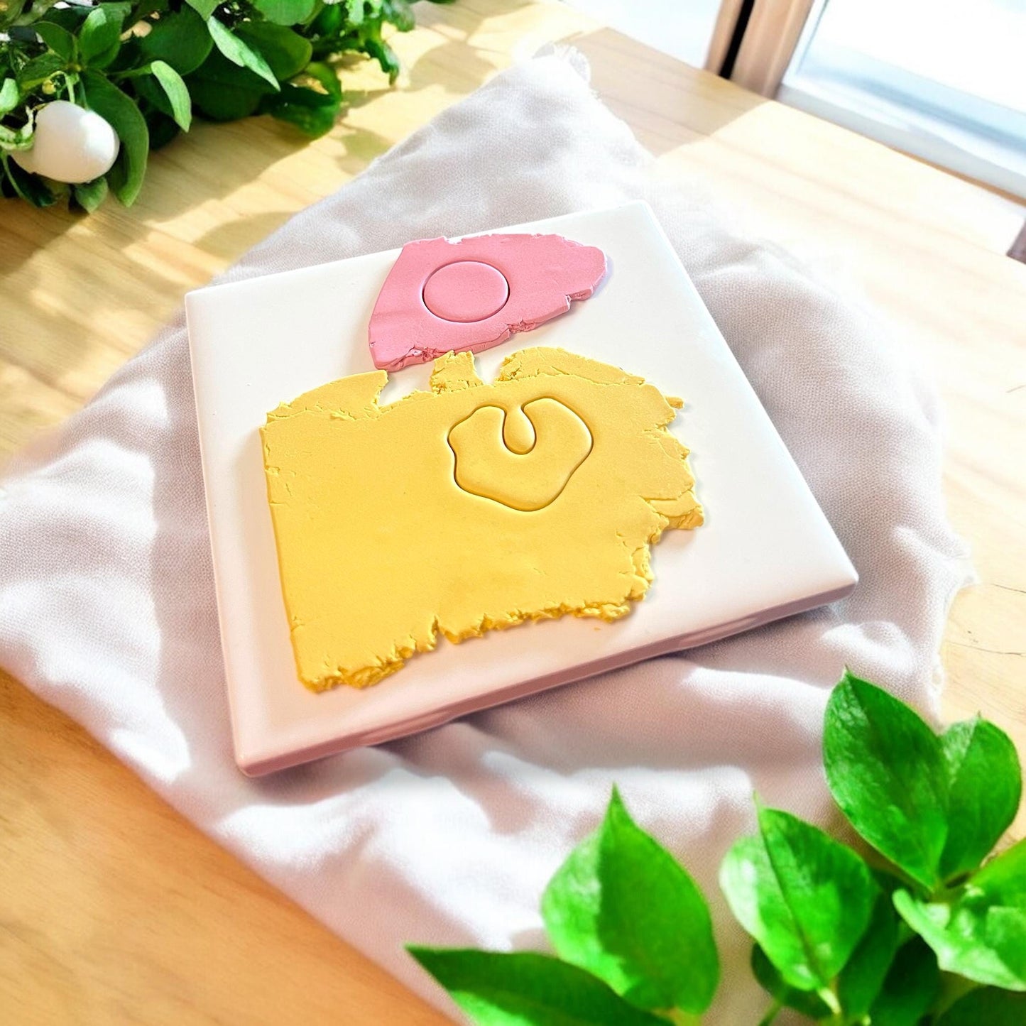 polymer clay slab with two cutouts