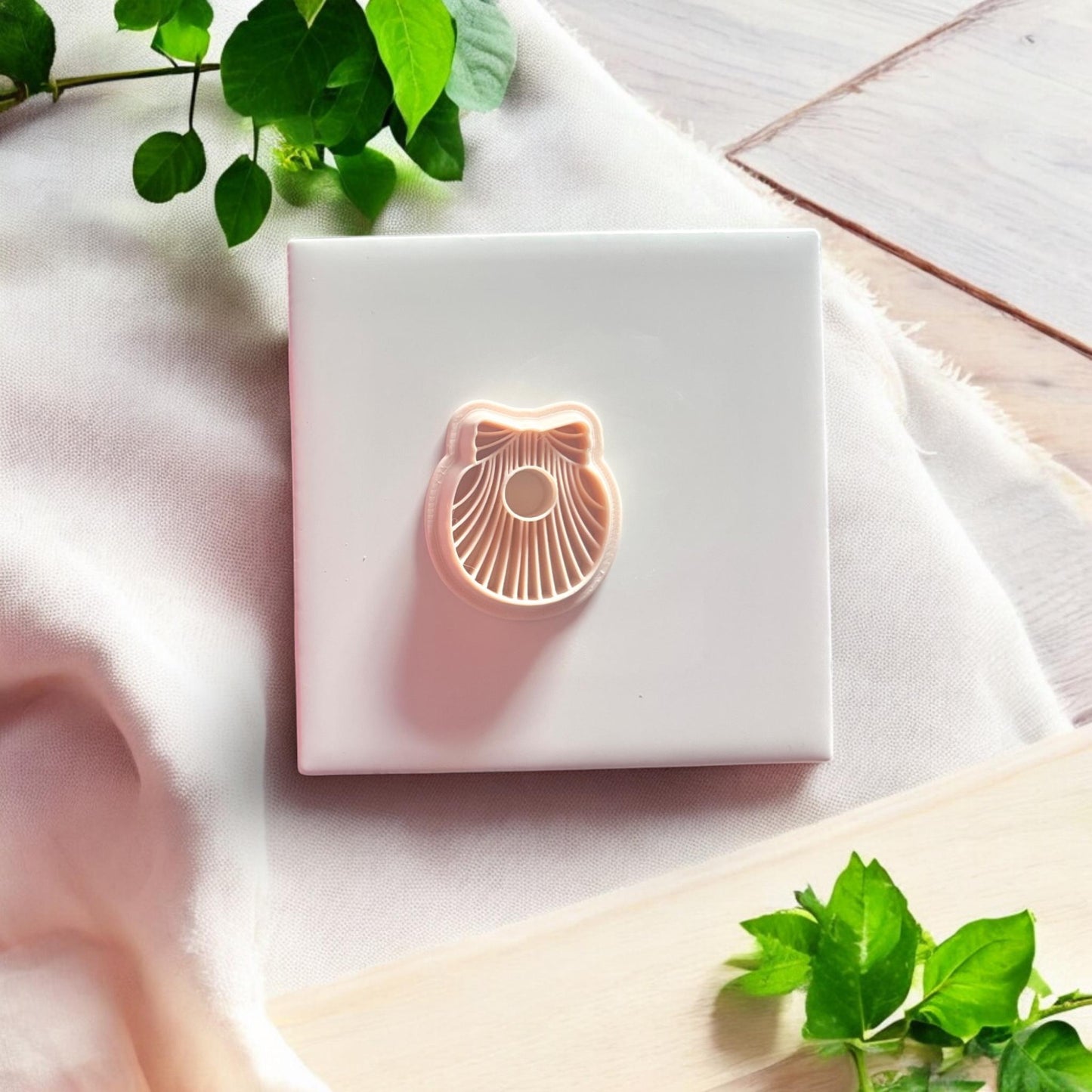 clay shell bow cutter