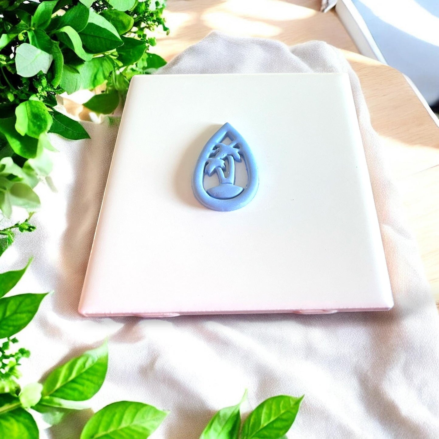 Scenic tropical drop shape clay cutter impression