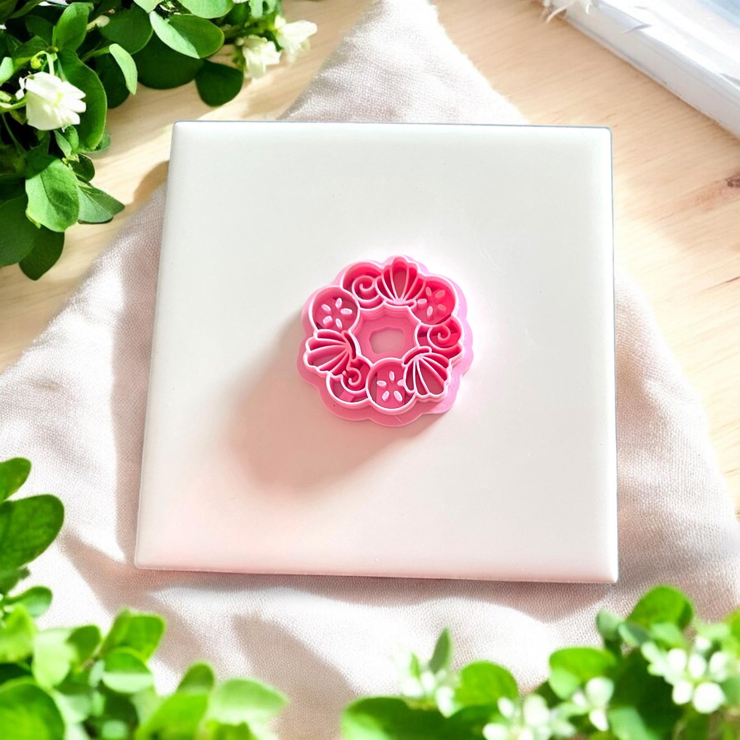 top view of detailed pink shell ring cutter