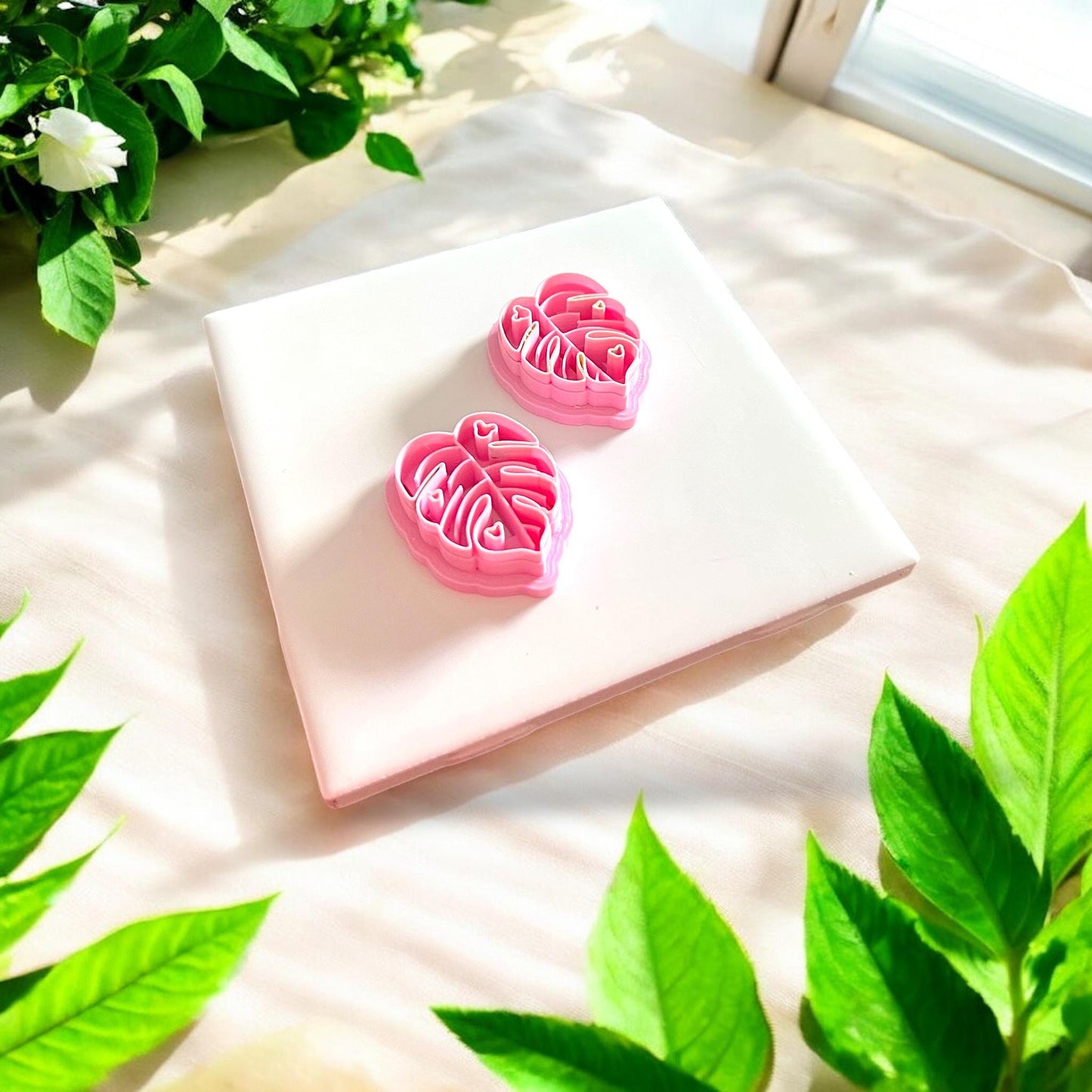 set of two pink leaf cutters displayed