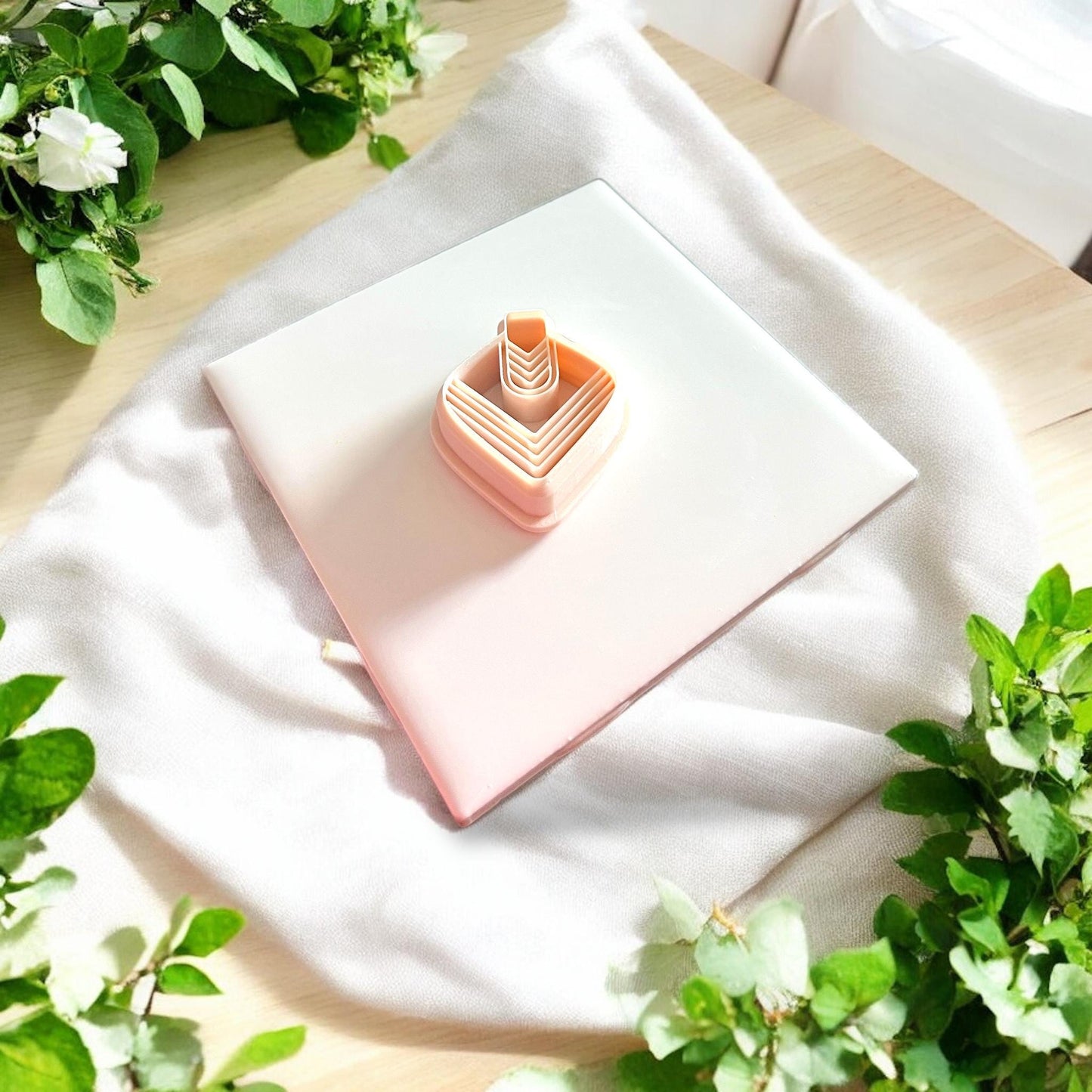 stacked boho clay cutters in peach tones