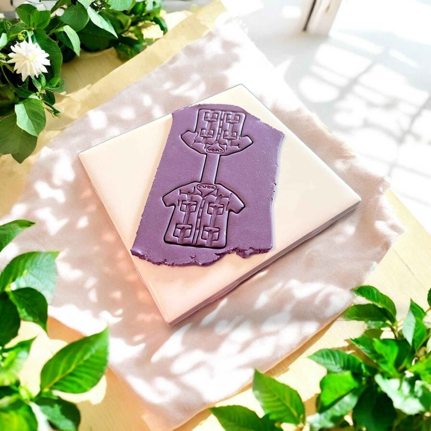 guayabera clay cutter pressed in purple clay
