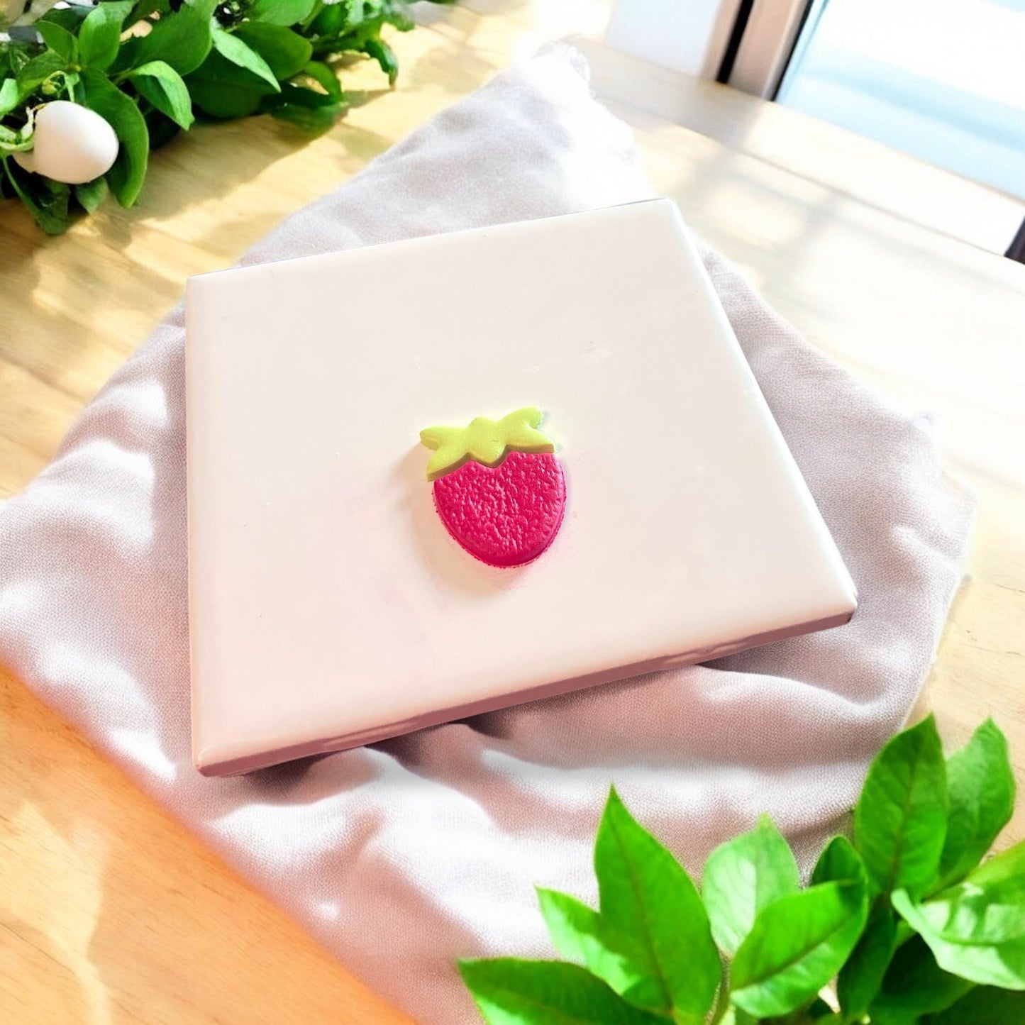 assembled strawberry clay piece
