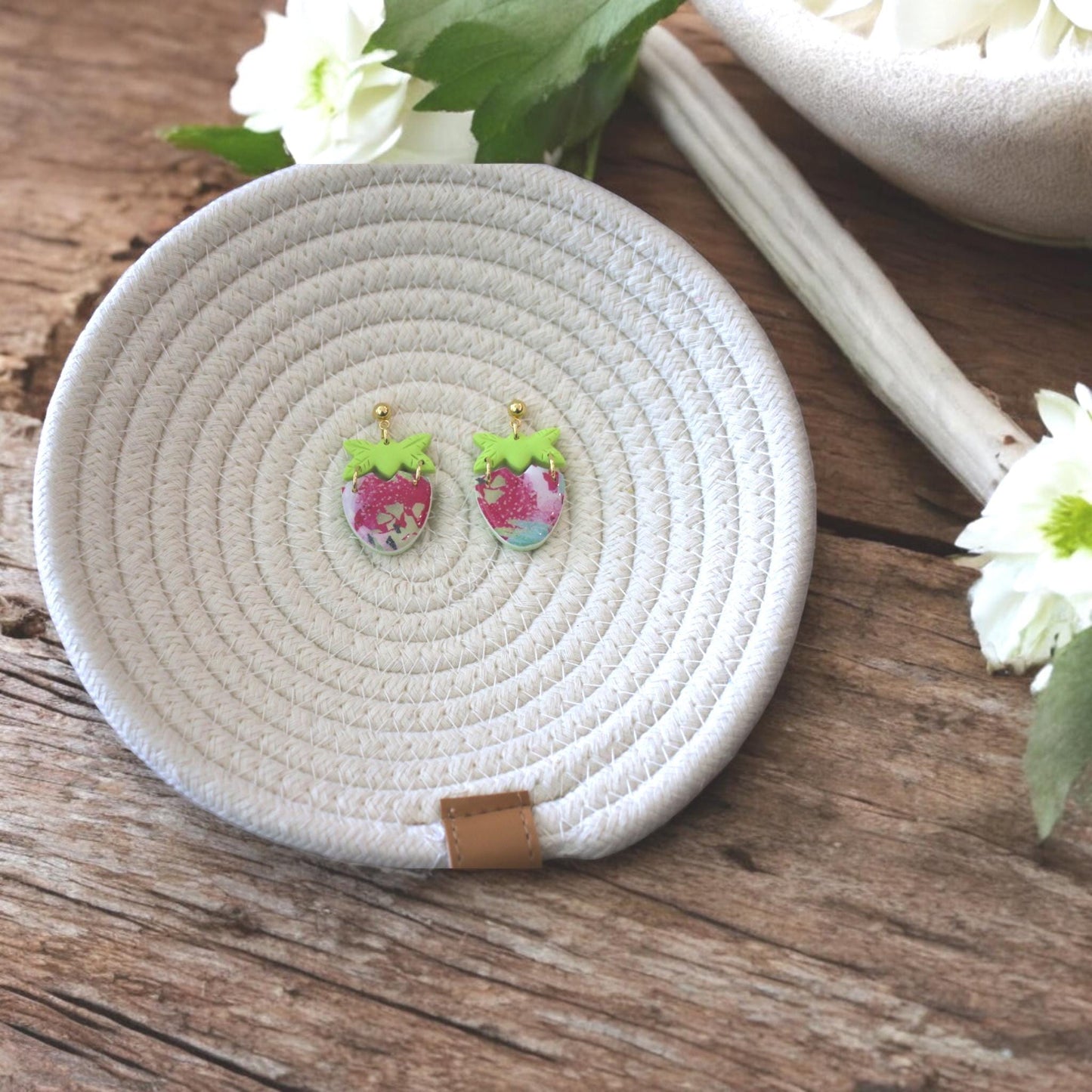 strawberry clay earrings on tray