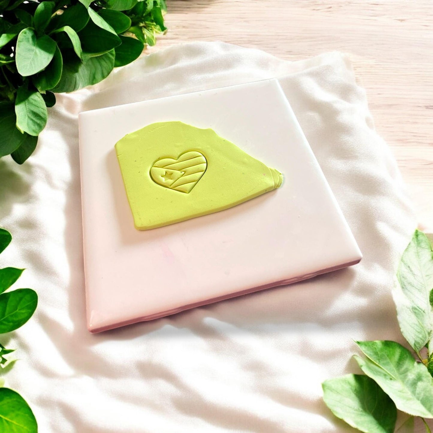 heart flag imprint on clay slab