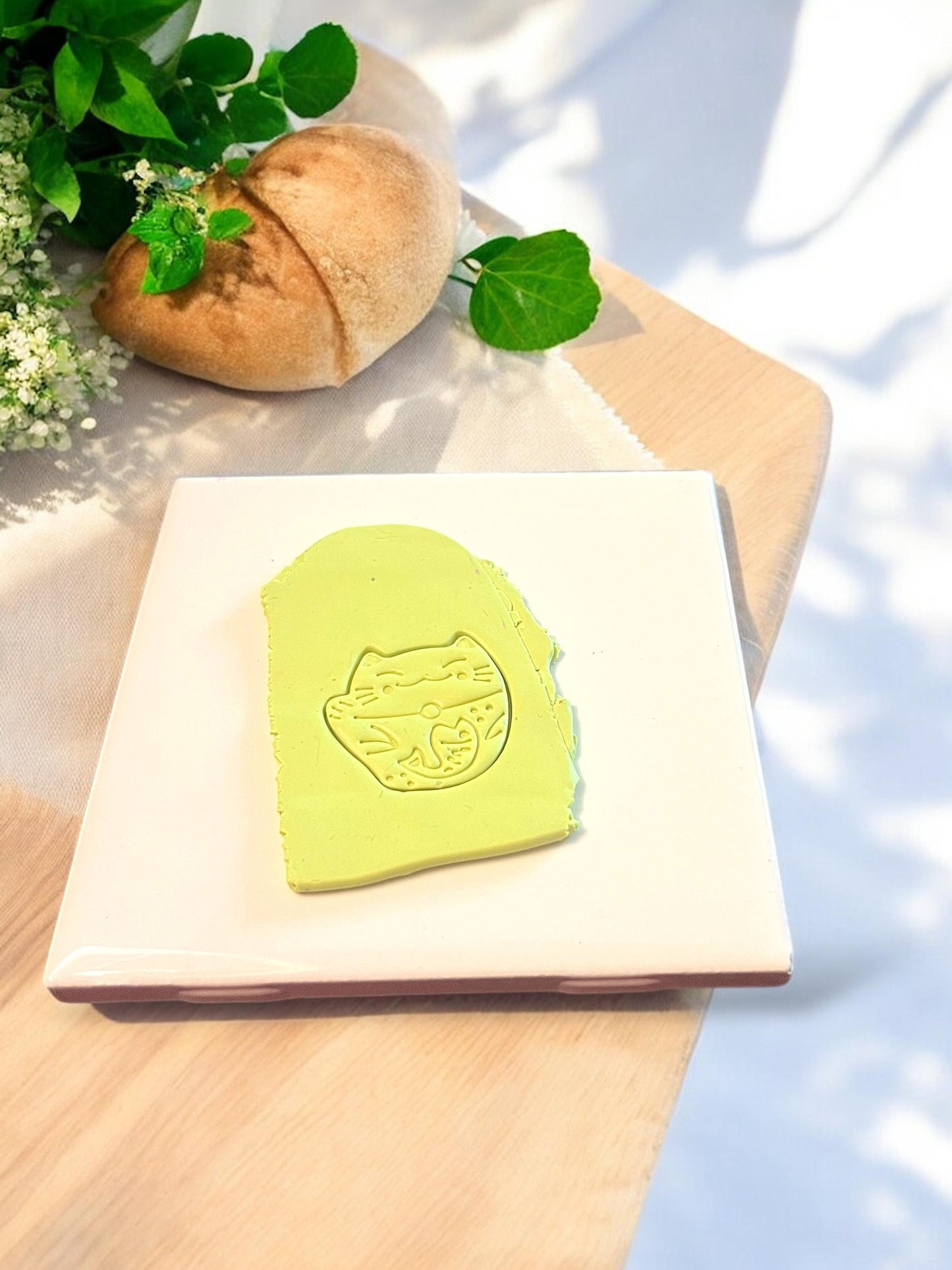 Polymer clay with lucky cat shape impressed using cutter for kawaii earring or charm design