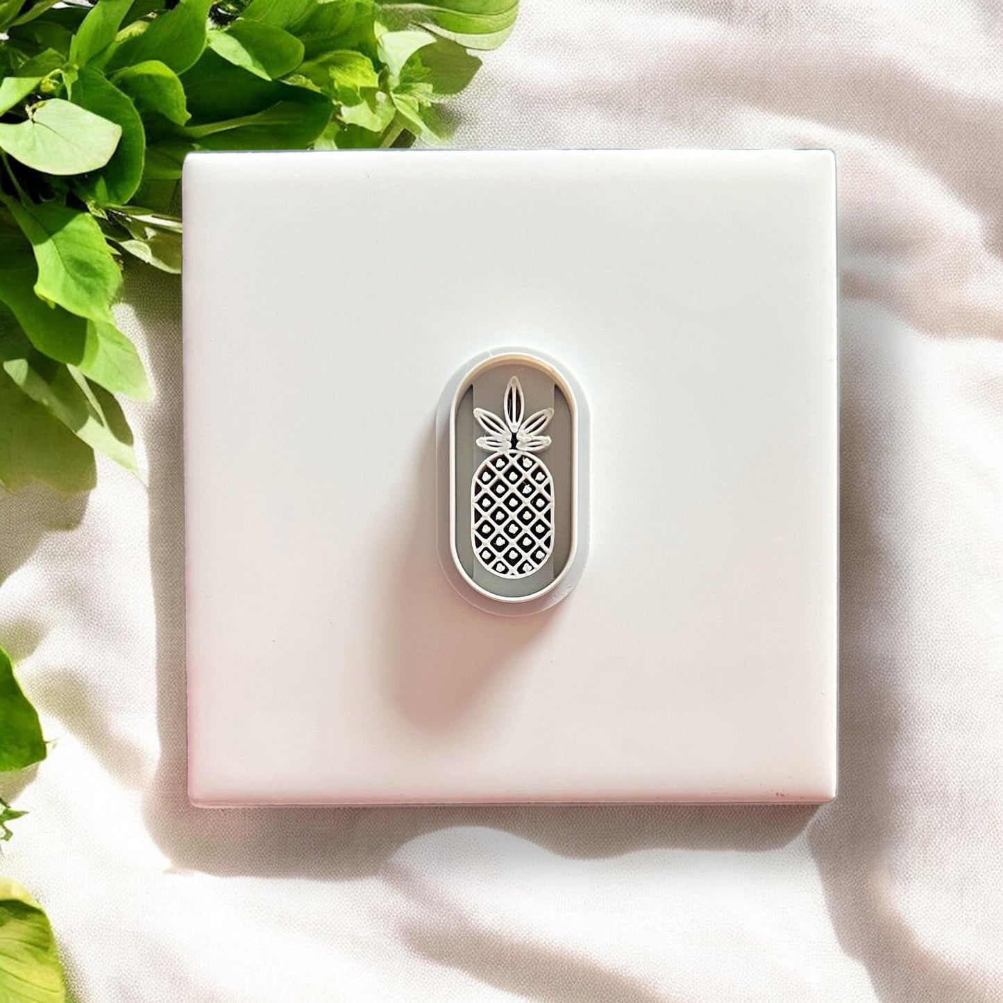 Pineapple arch cutter alone on white tile