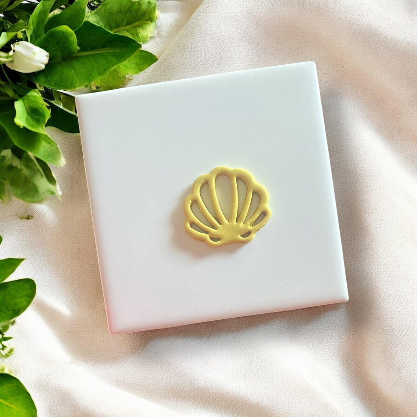 Side profile of the shell cutout cutter highlighting its intricate details.