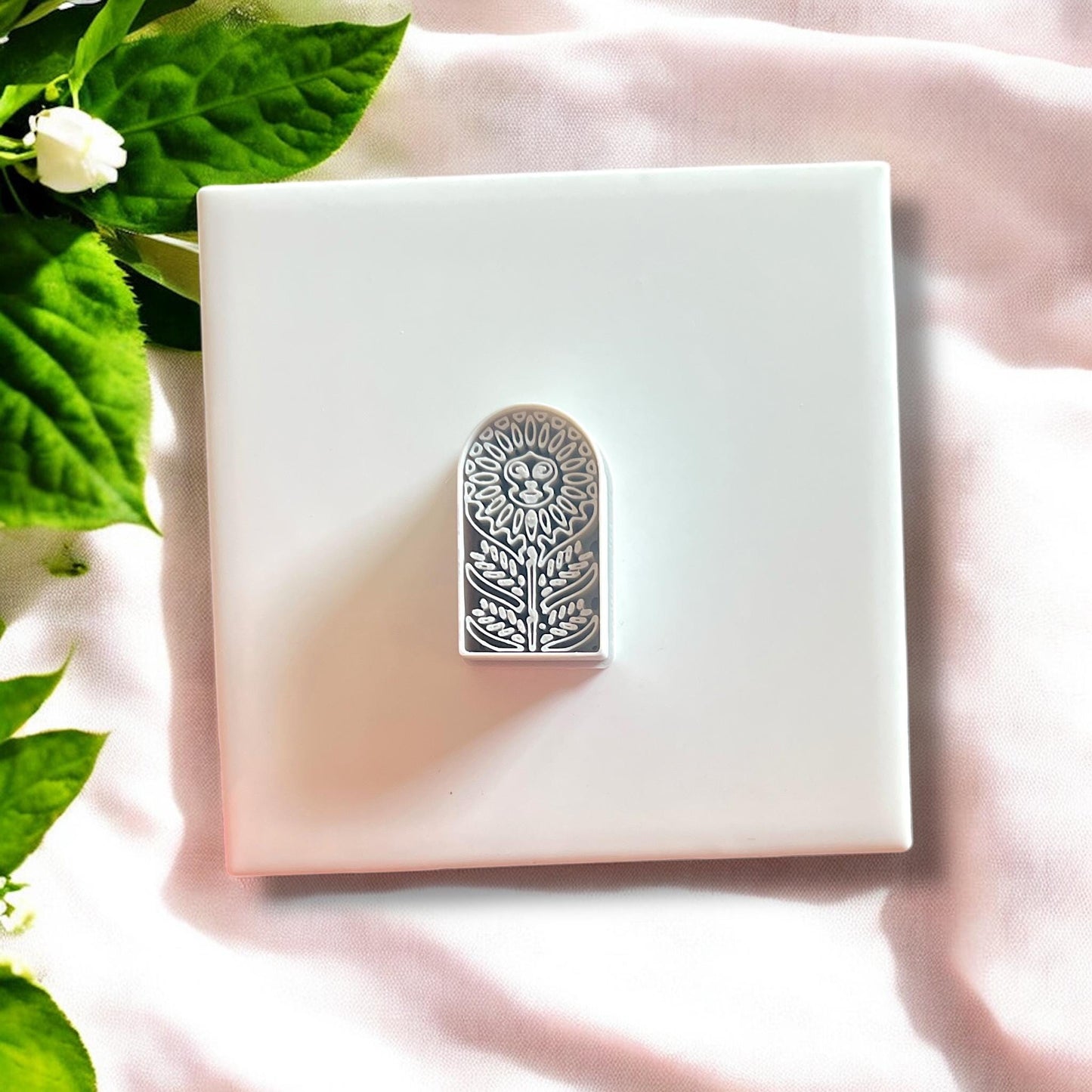 Scandinavian arch sunflower design, both clay impression and cutter, ideal for floral dangle earrings.