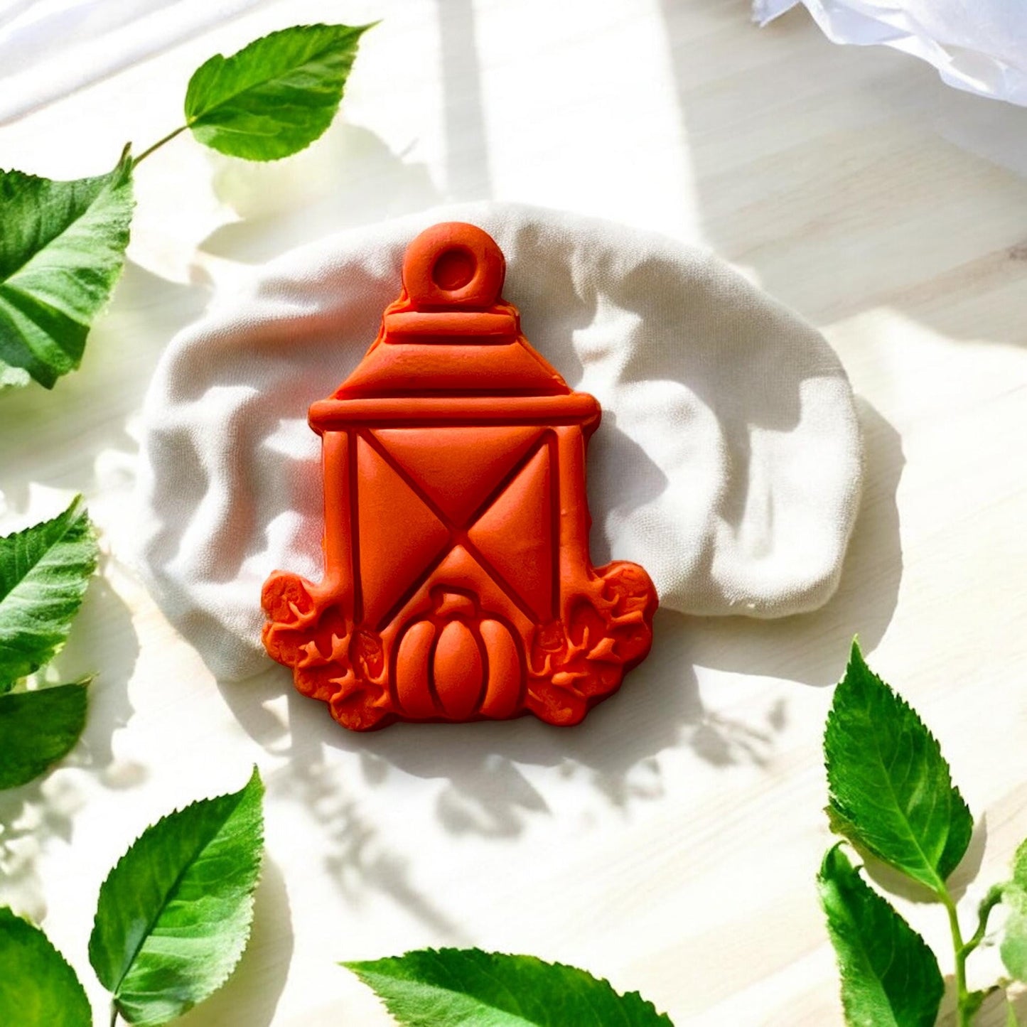 close-up of fall pumpkin lantern earring design