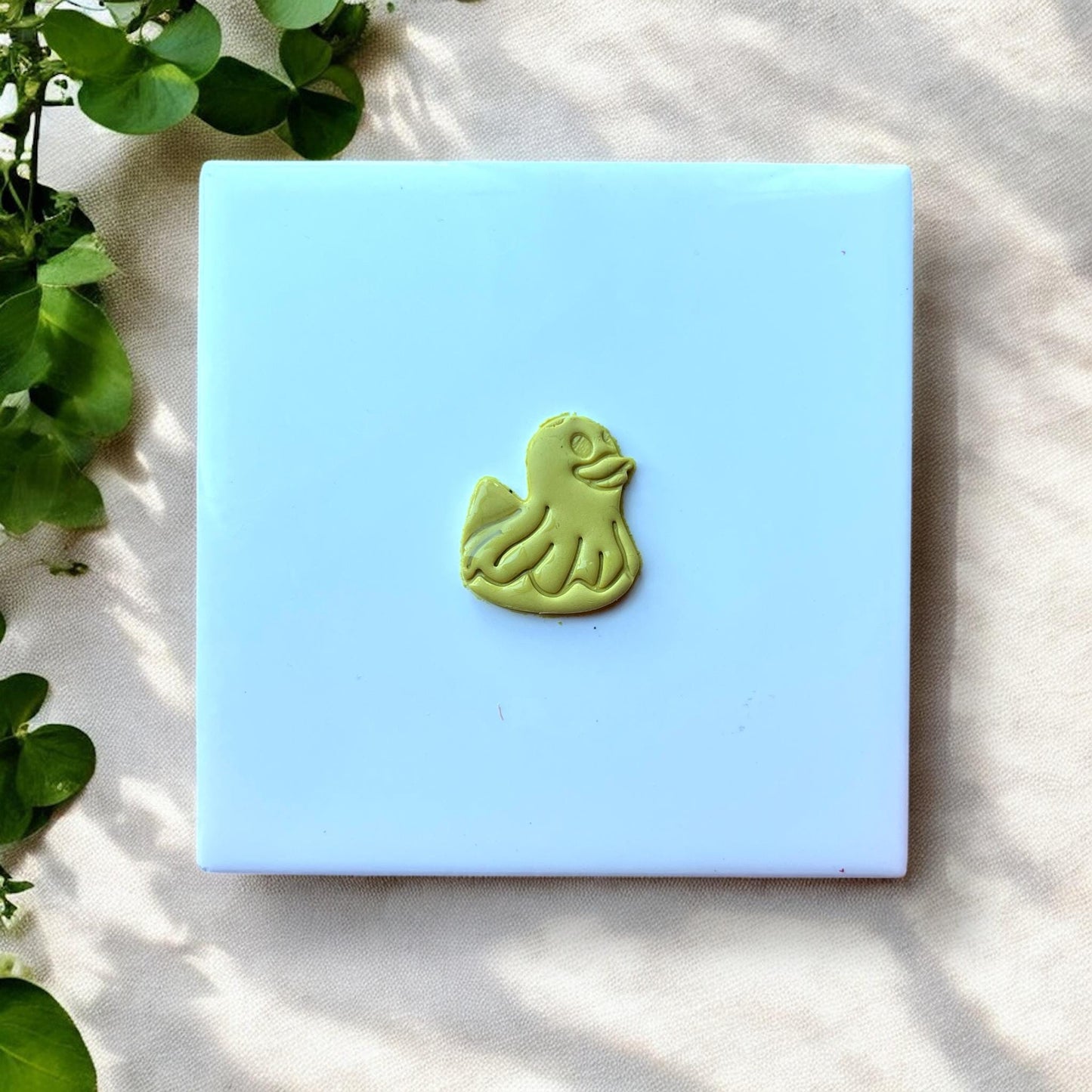 Finished duck floatie clay piece after cutting