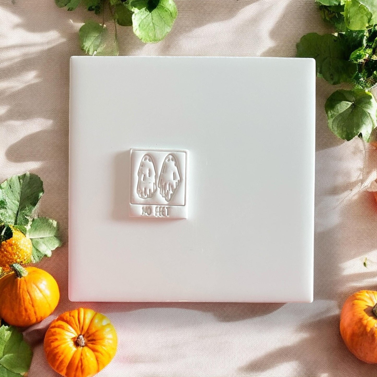 Finished No Feet ghost shape on white tile