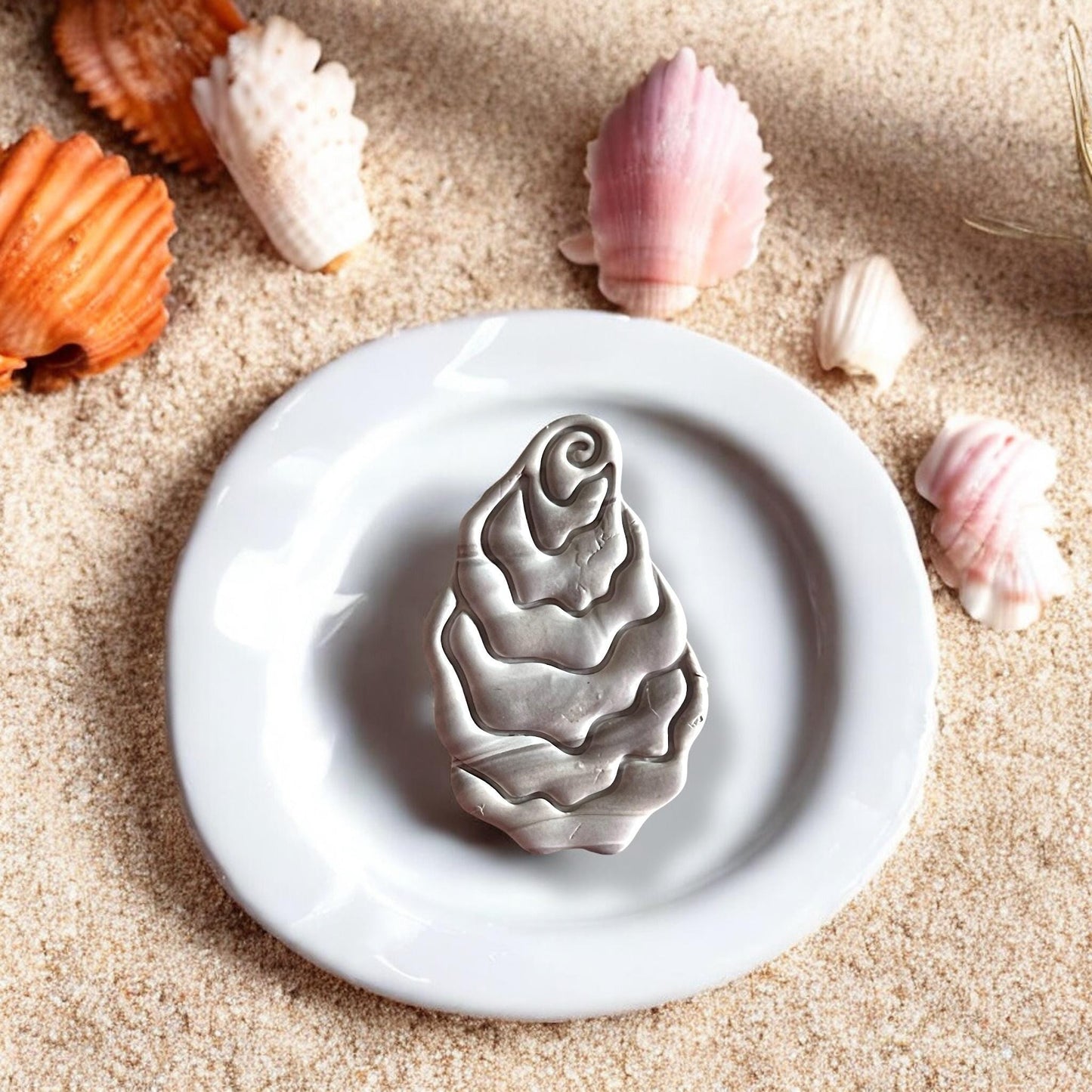Close-up of oyster earring made with cutter
