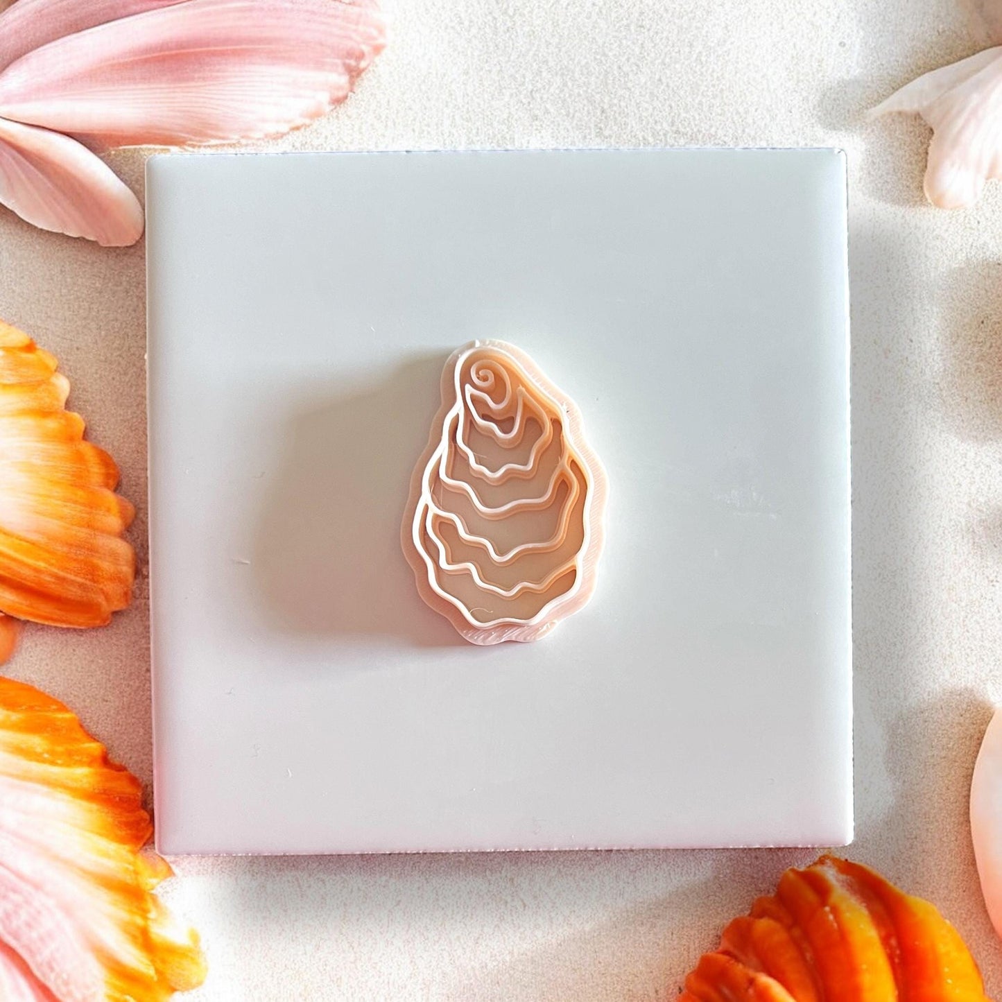 Polymer clay oyster earring cutter with detailed shell layers