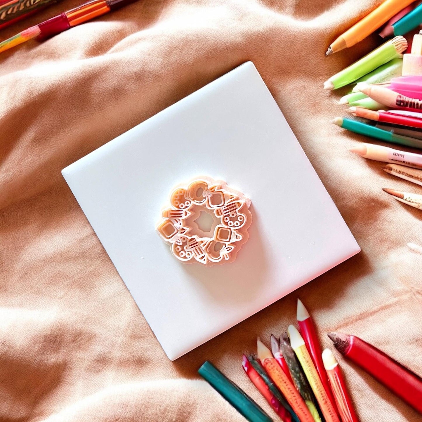 Polymer clay wreath made from school supplies