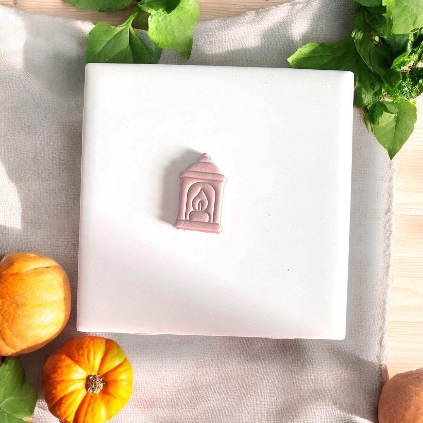 Finished polymer clay lantern shape with flame detail
