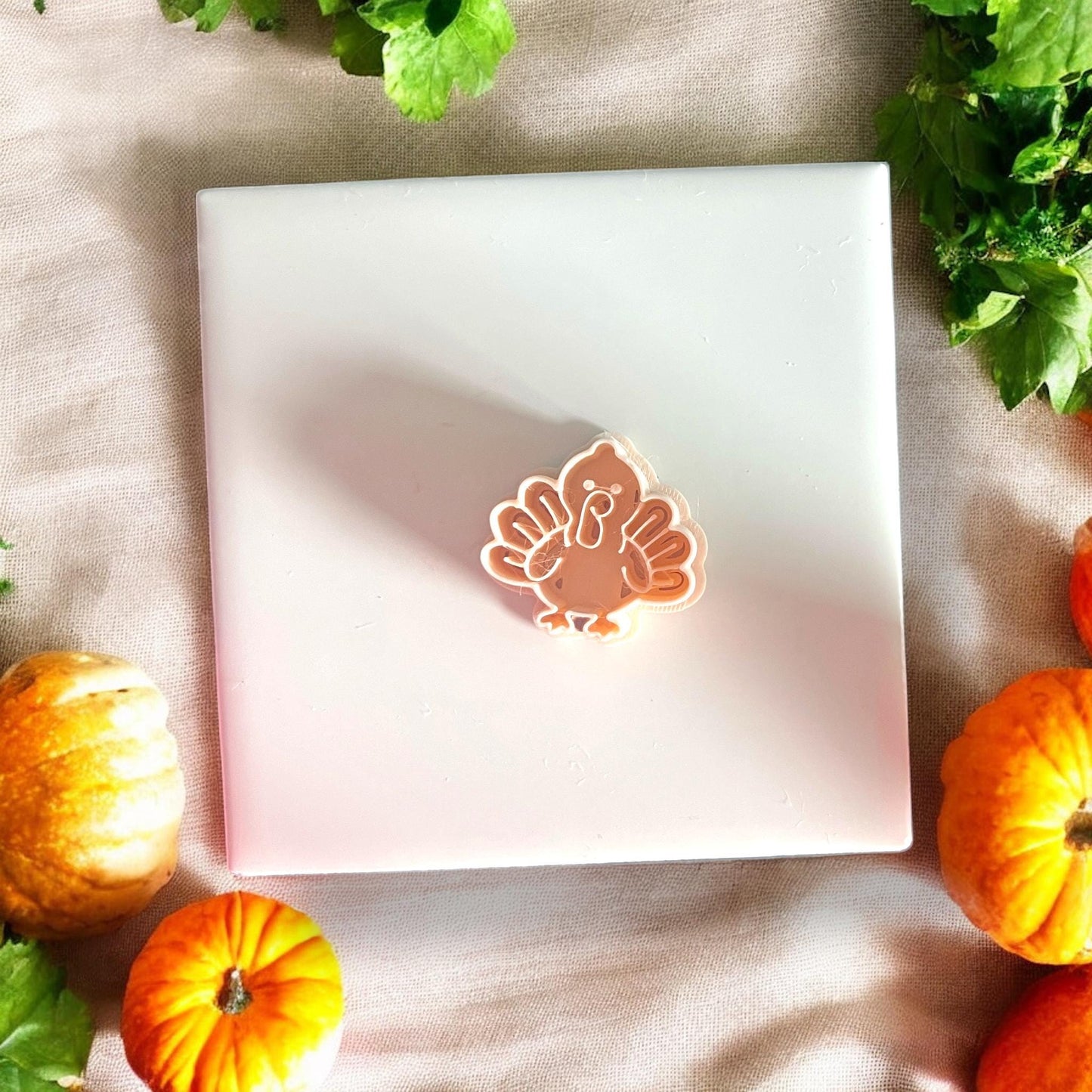 turkey cutter on white tile