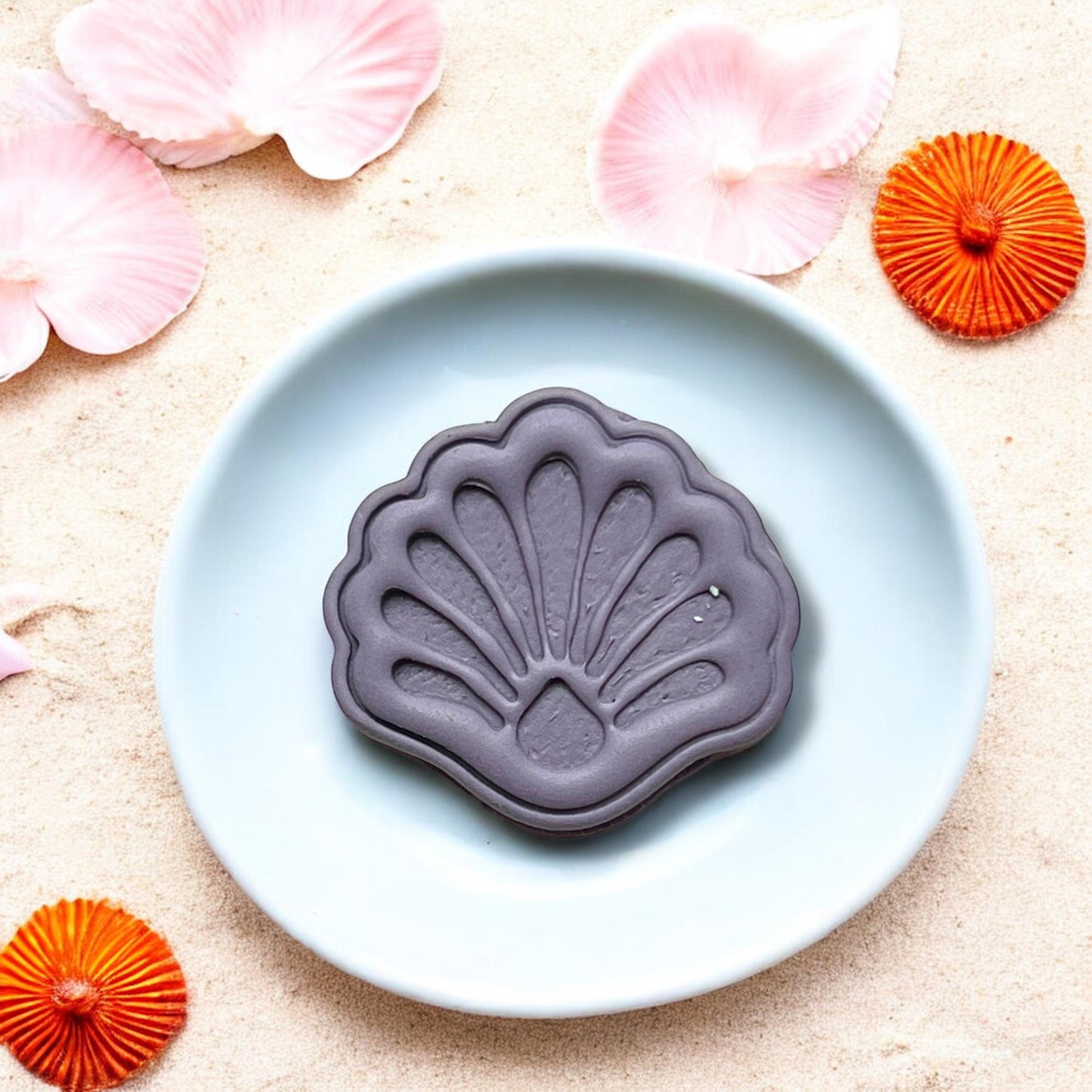 Finished purple shell piece on round plate