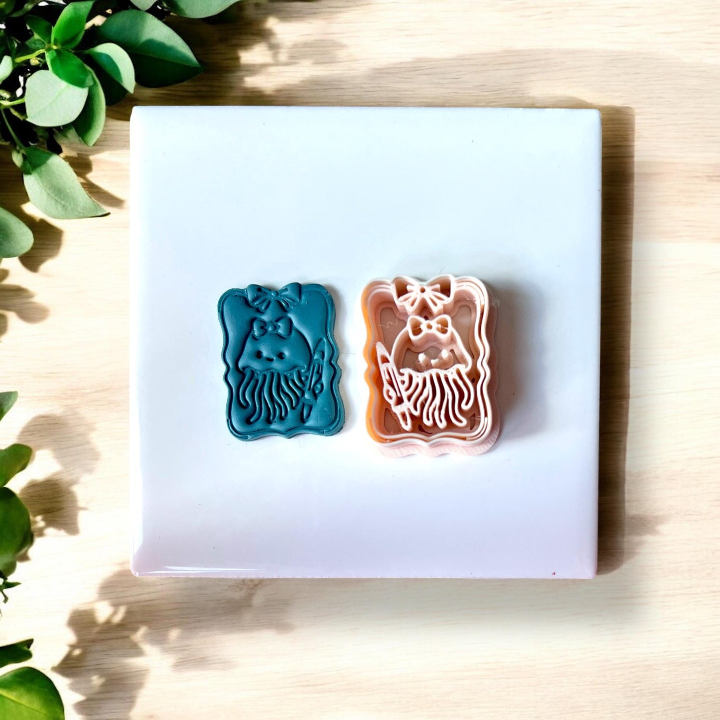 Jellyfish clay impressions with bow and pencil detail