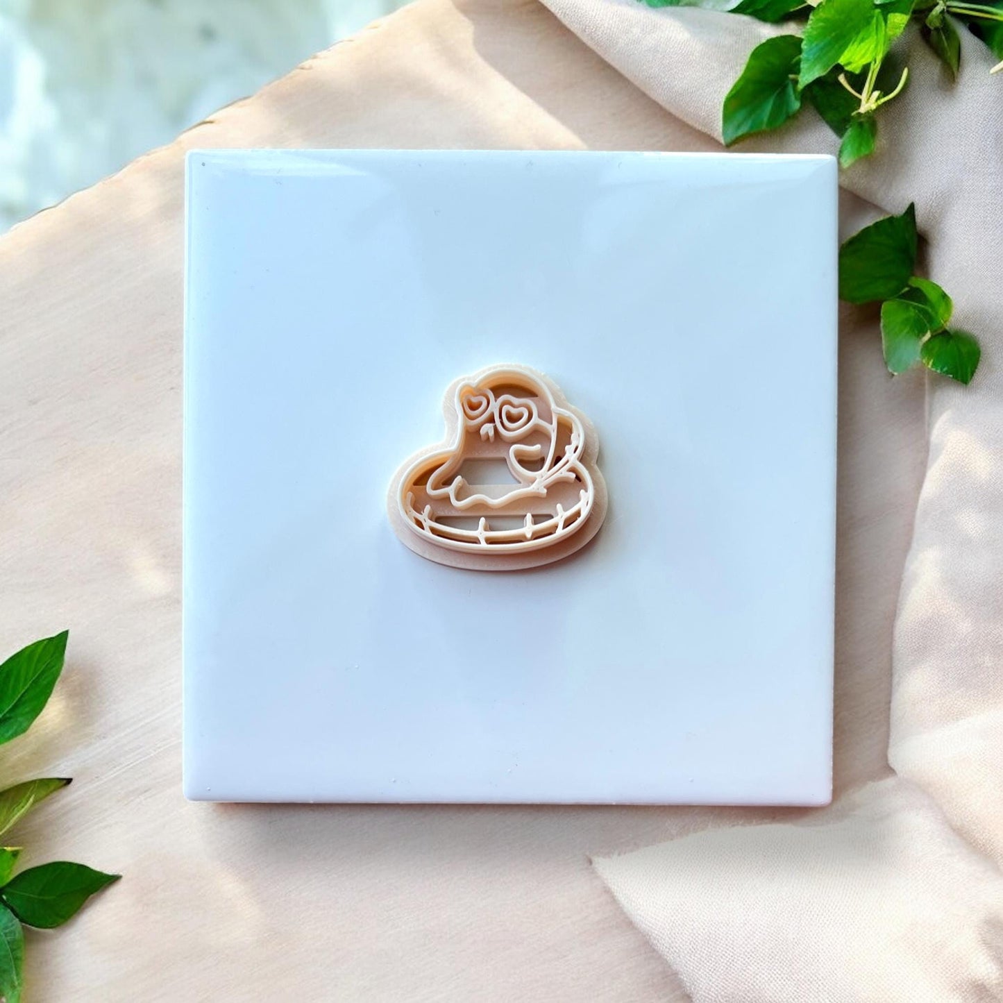 Polymer clay cutter tool of ghost on floatie