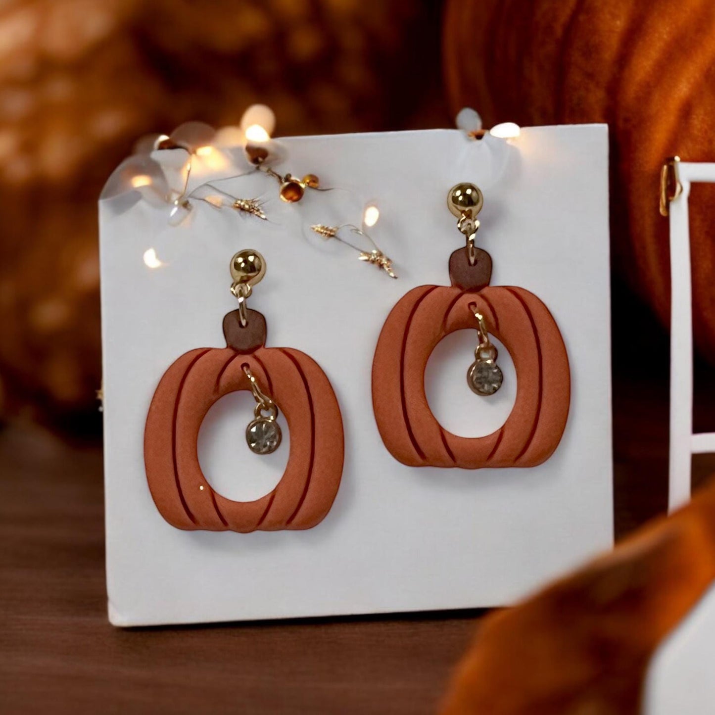 Finished fall pumpkin earrings with dangling charm