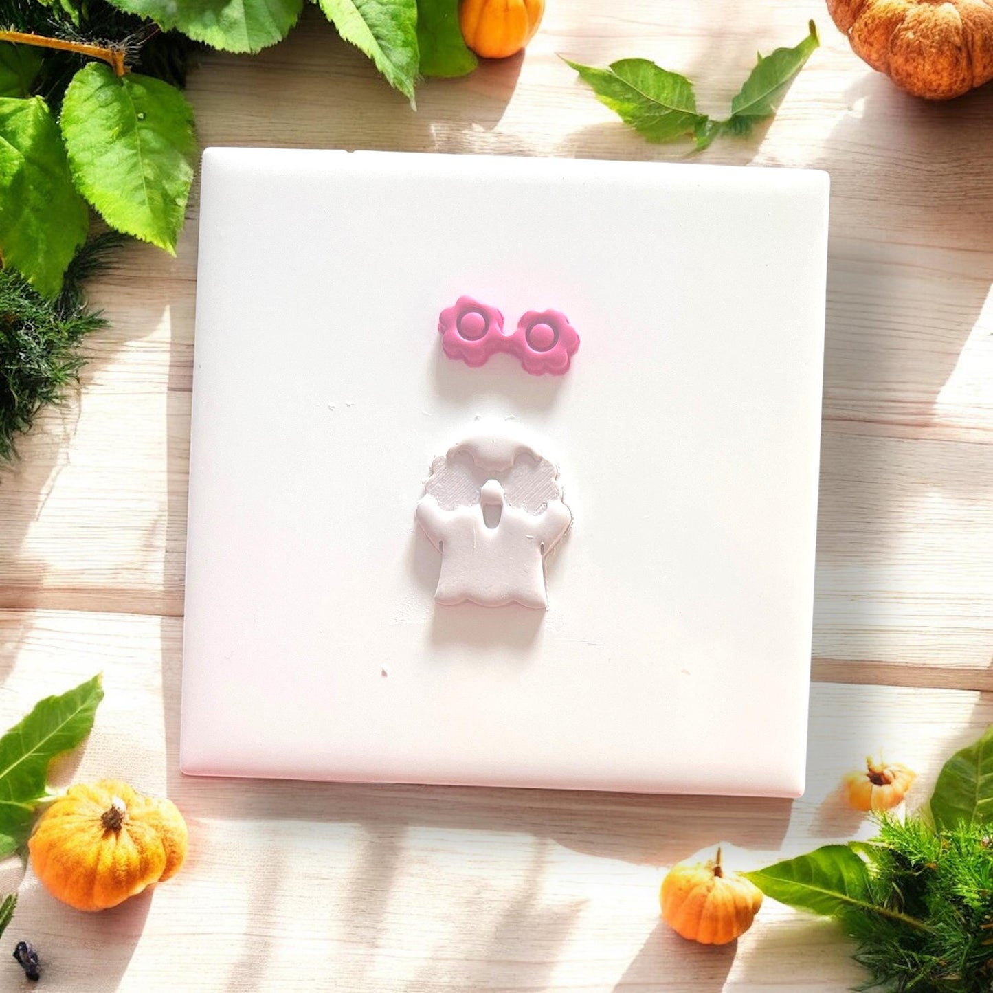 ghost clay cutout with glasses