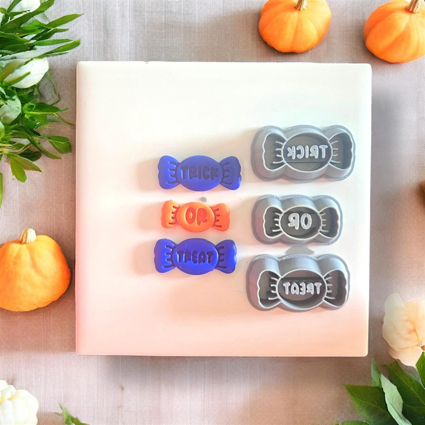 Finished "Trick Or Treat" candies shown next to coordinating cutter set