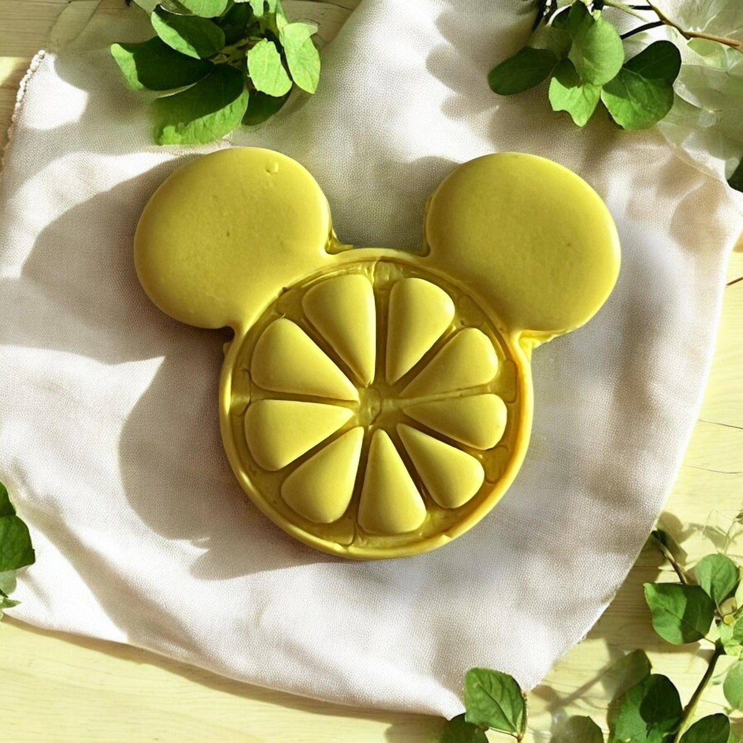 Close-up of detailed citrus segments inside mouse shape