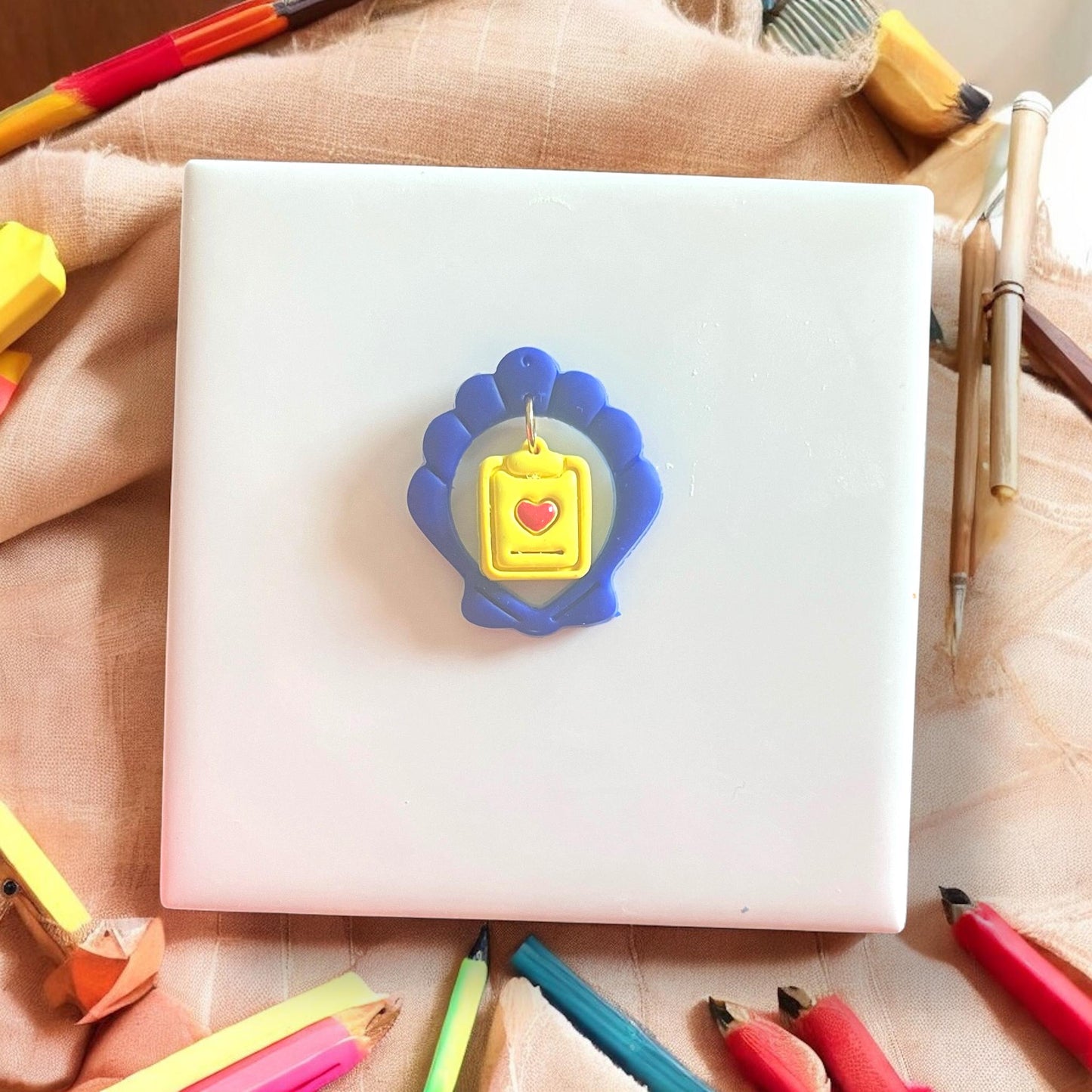 Polymer clay shell with back-to-school twist