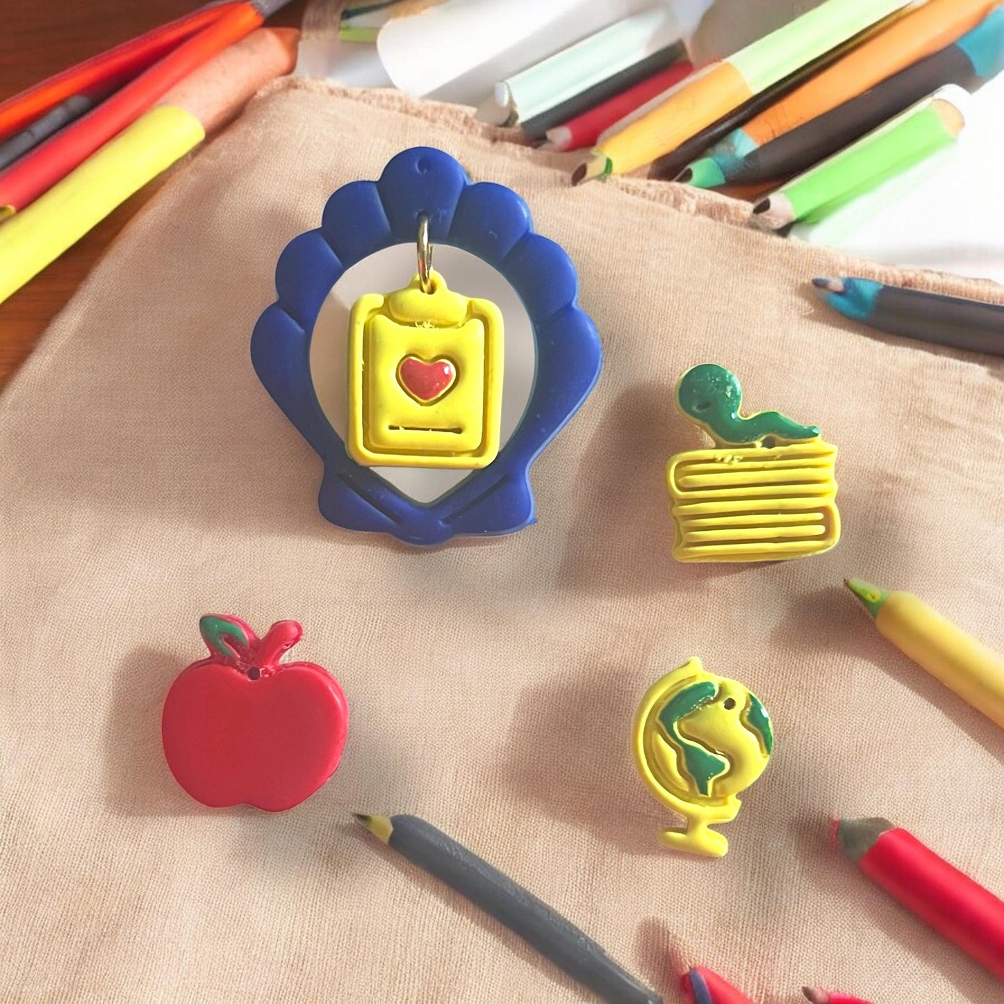 Apple and globe inside scallop shell cutter