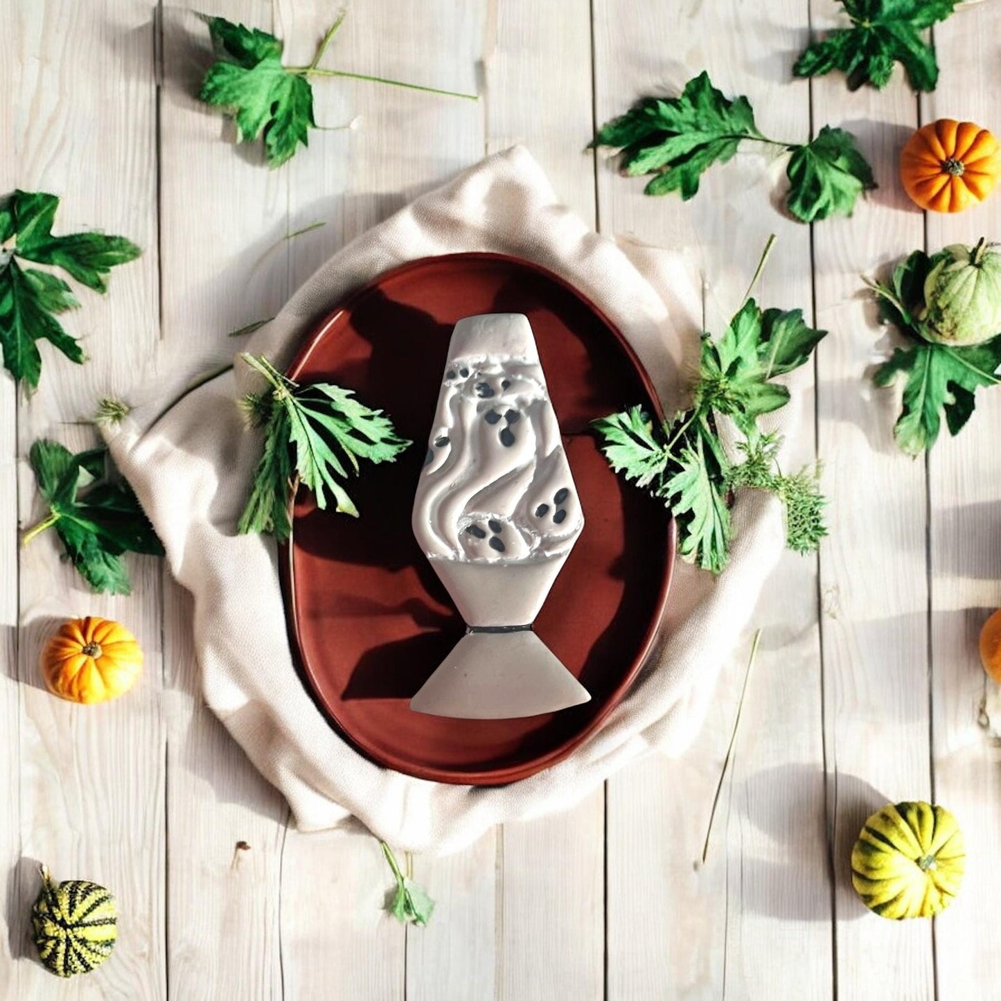 Ghost lava lamp polymer clay cutter with festive background