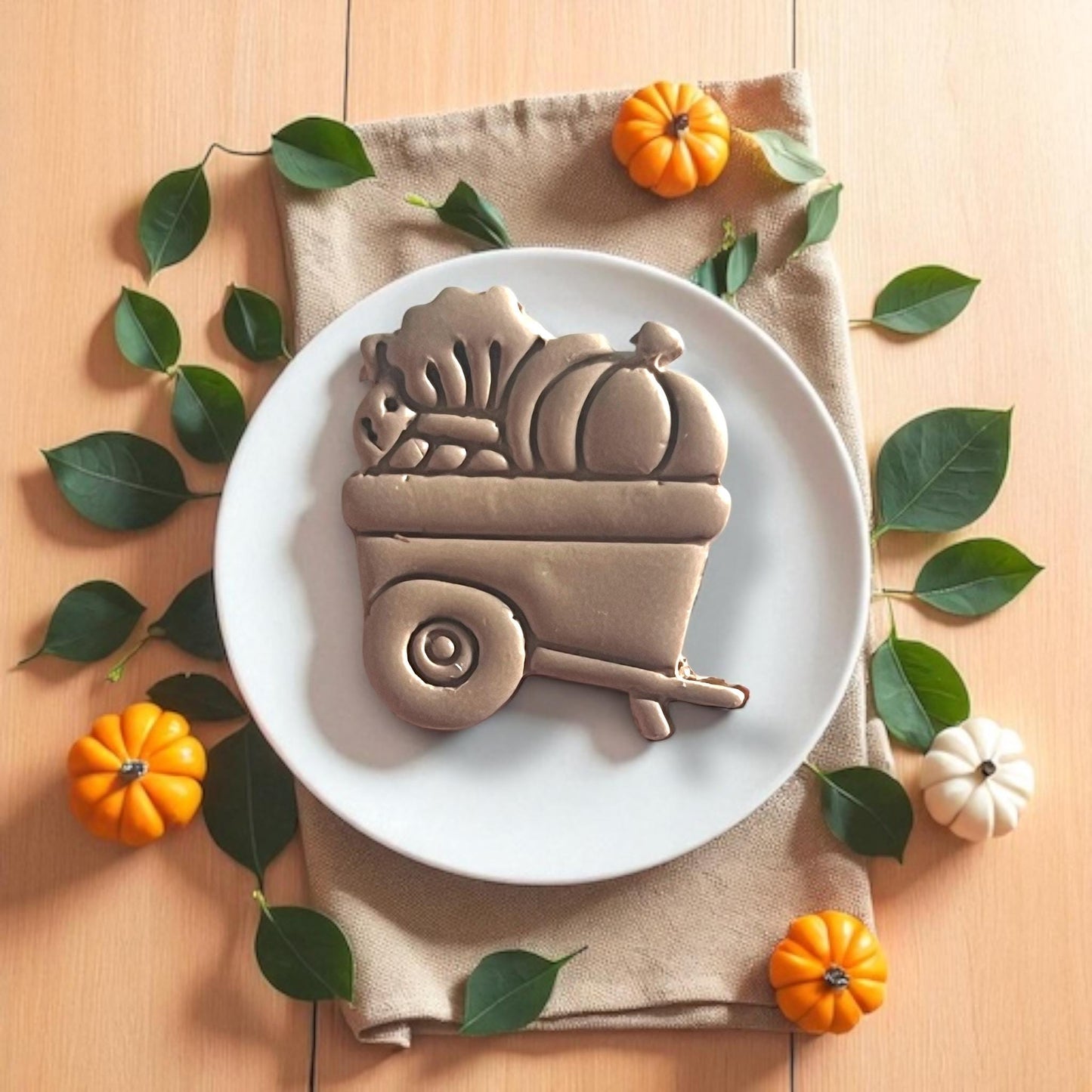 pumpkin wheelbarrow clay piece close-up