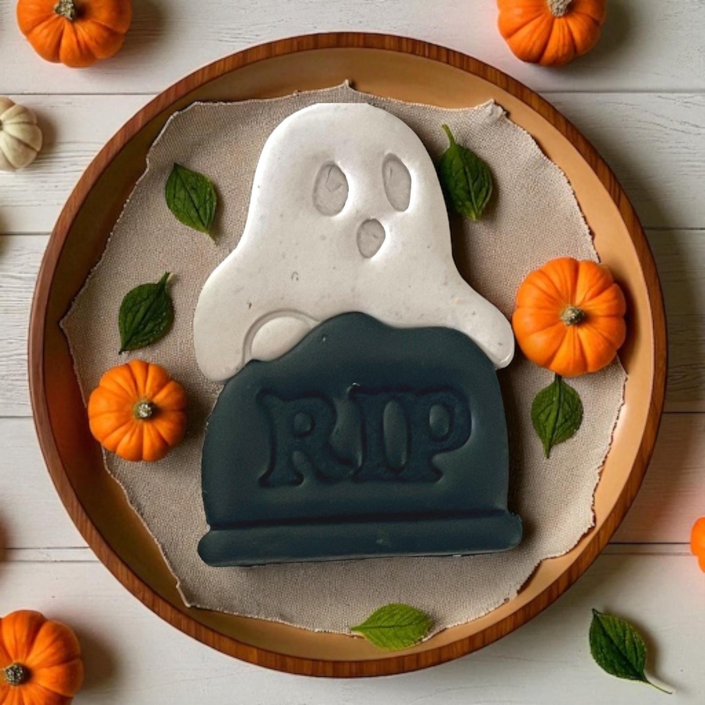 Close-up of mini RIP ghost cutter on white tile