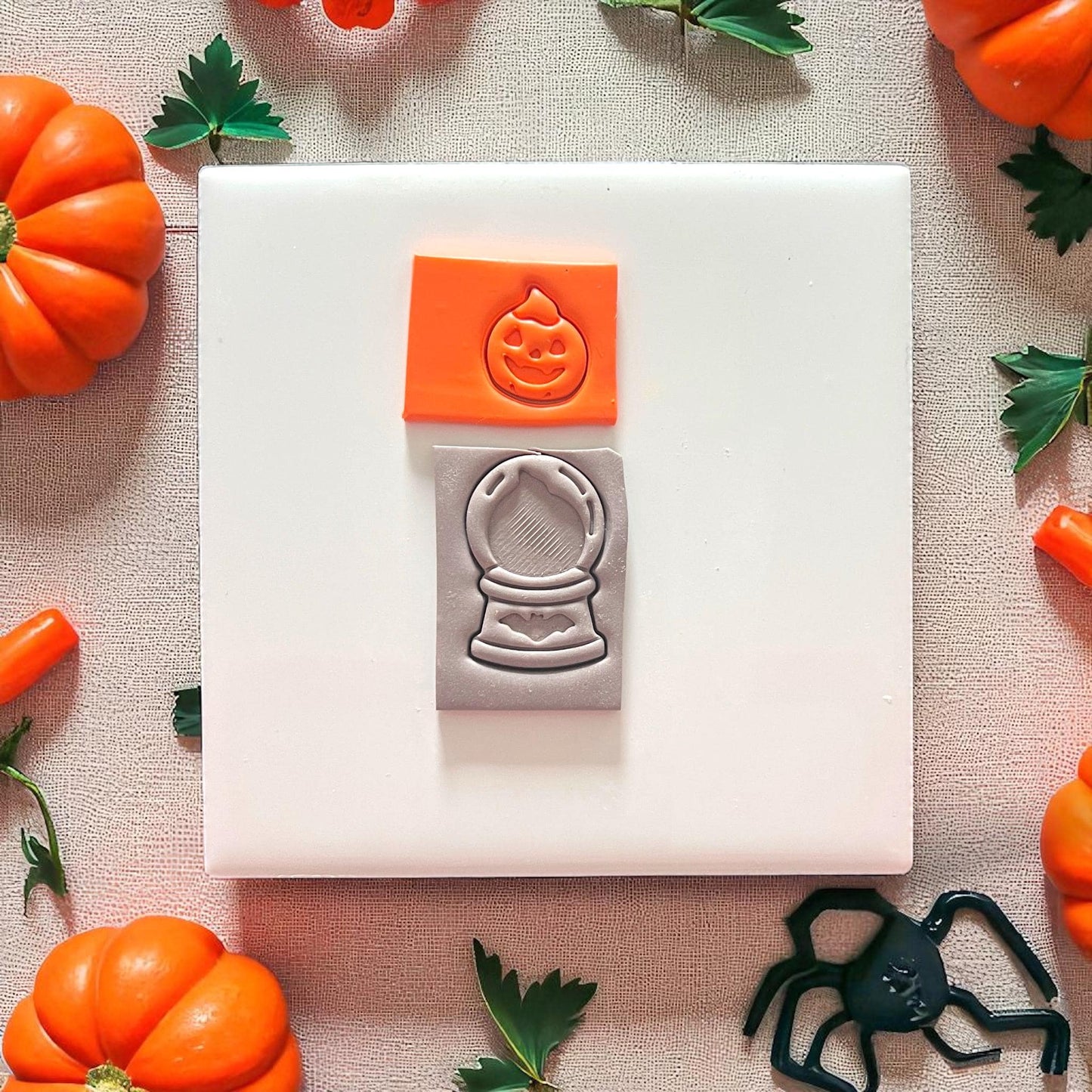 Pumpkin crystal ball clay slab on plate with fall decor
