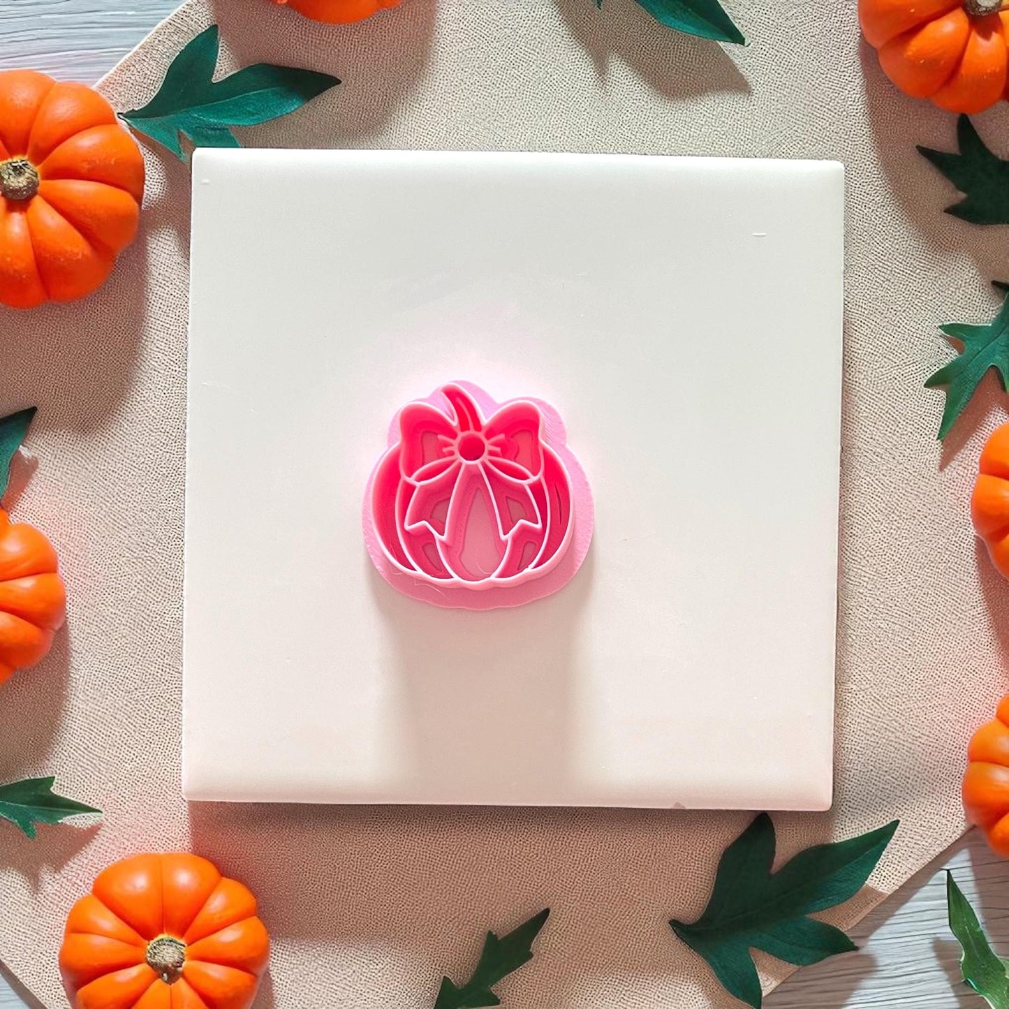 Pumpkin bow cutter on display tile