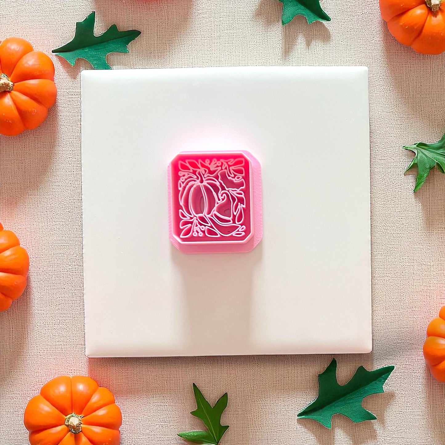 pink polymer clay cutter with pumpkin and witch hat design