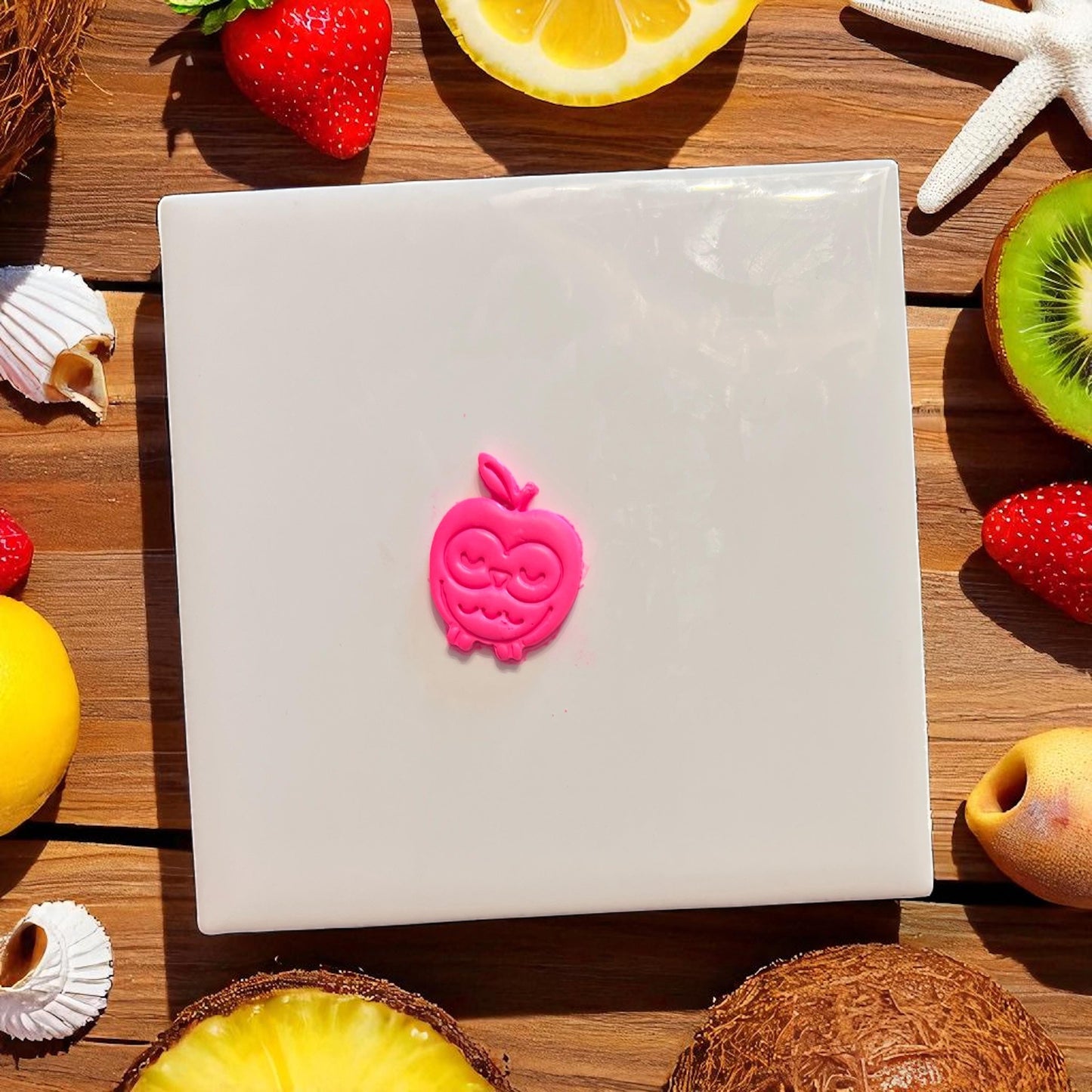 Clay cutter and impression set of owl apple shape on white background