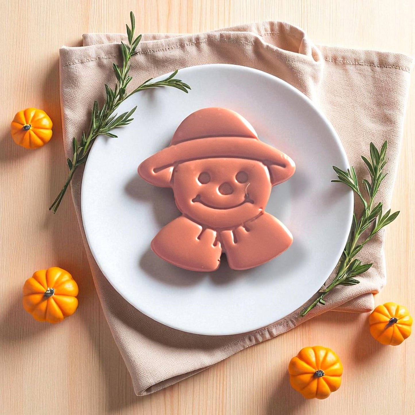 Close-up of scarecrow clay piece on plate
