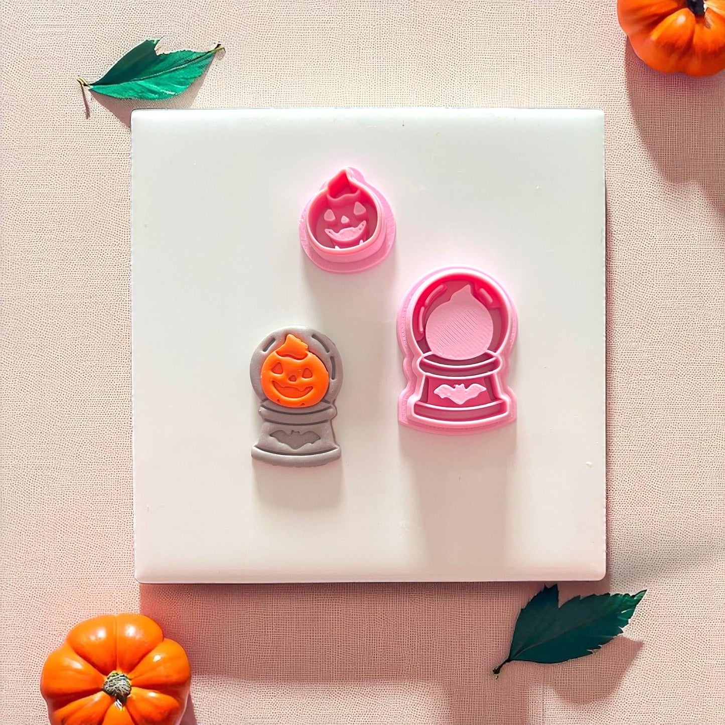 Pumpkin crystal ball with two-piece clay cutter set displayed