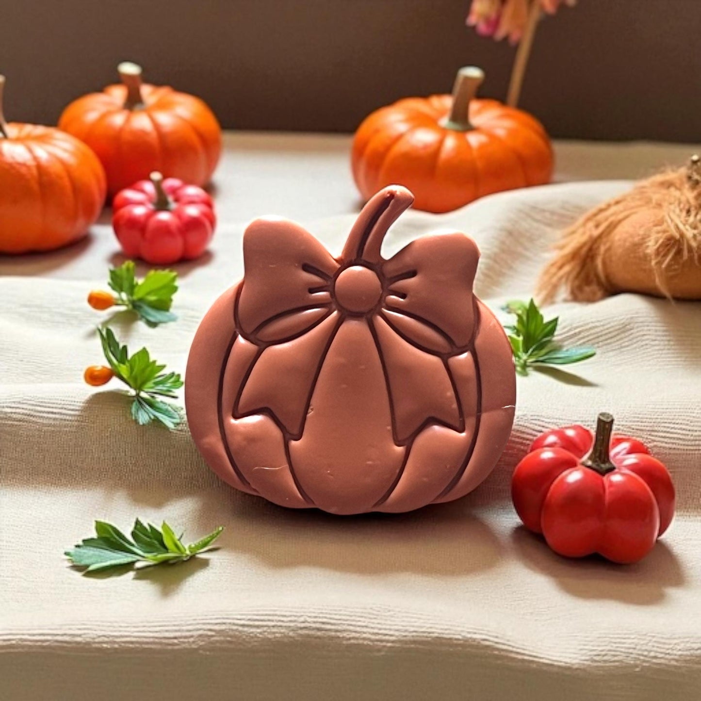 Pumpkin earring clay impression with decor