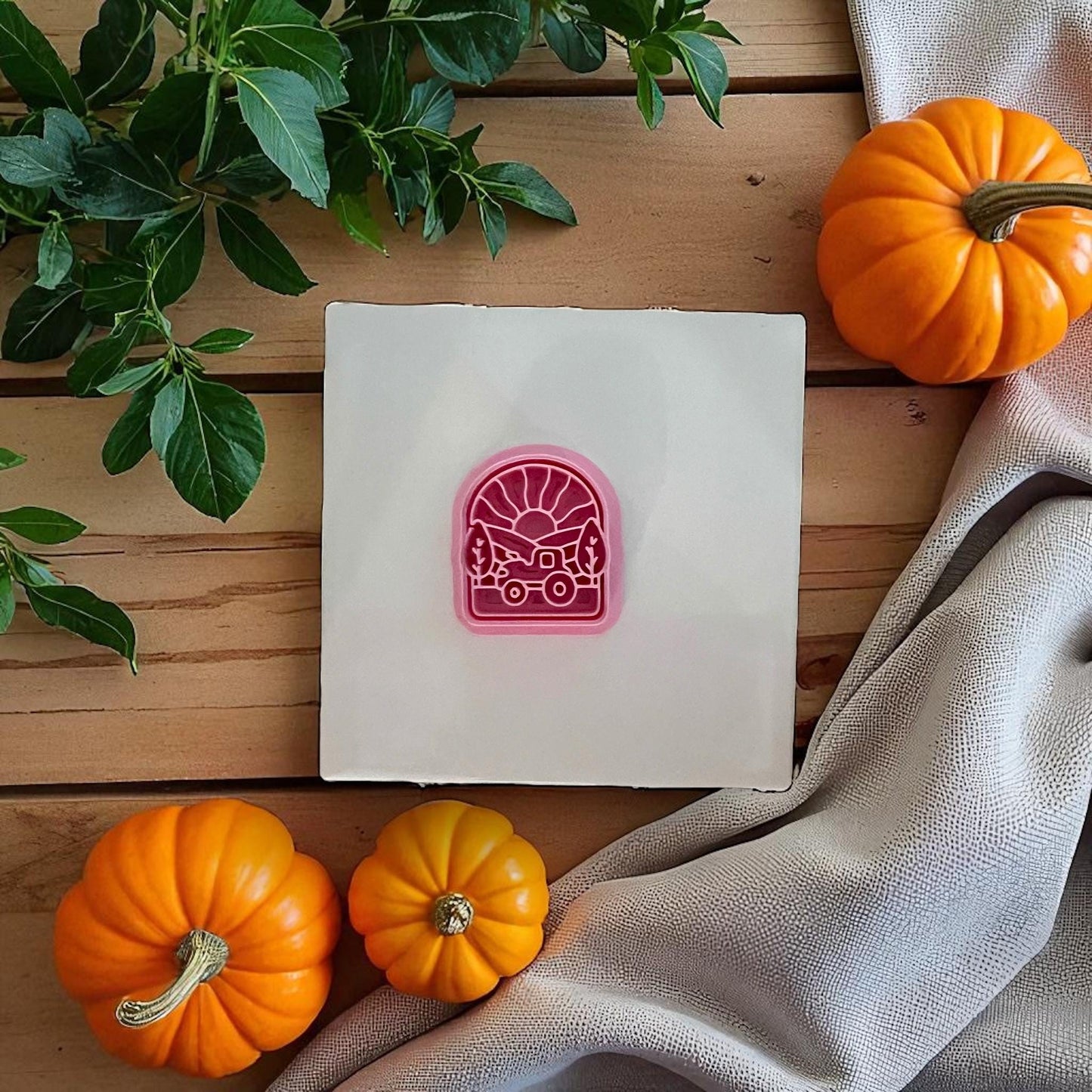 Pink tractor scene polymer clay cutter with pumpkins