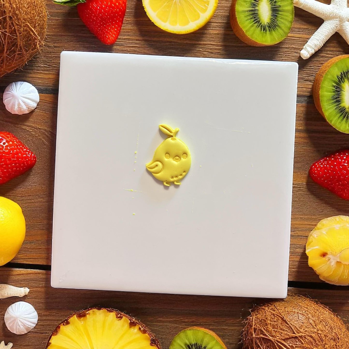 cut lemon chick shape from yellow clay