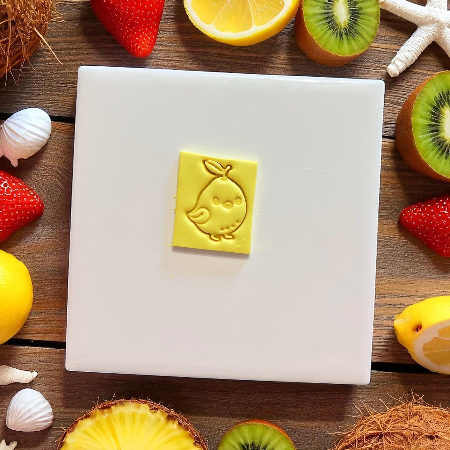 lemon chick clay cutter imprint on yellow clay slab