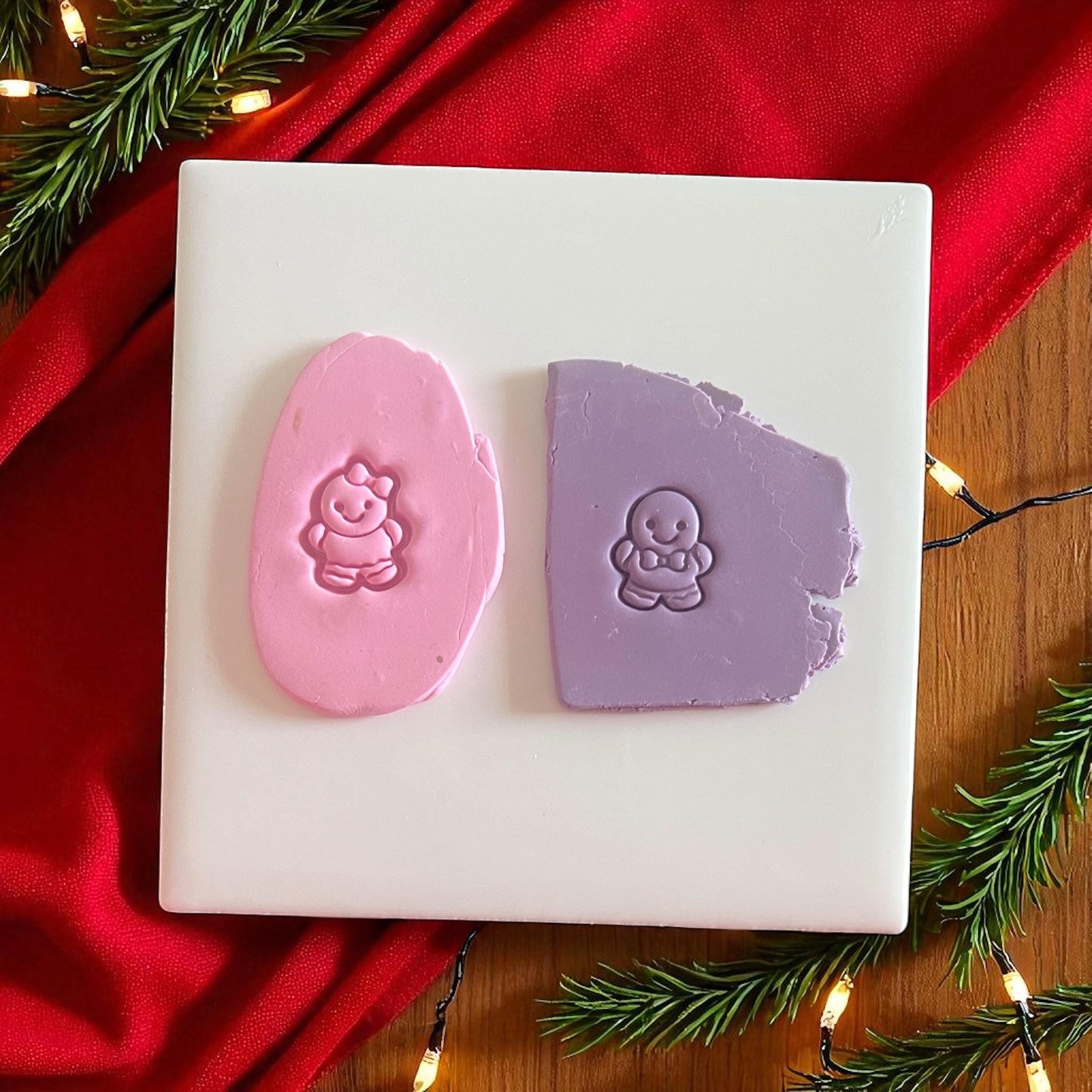 Pink and purple gingerbread impressions on clay