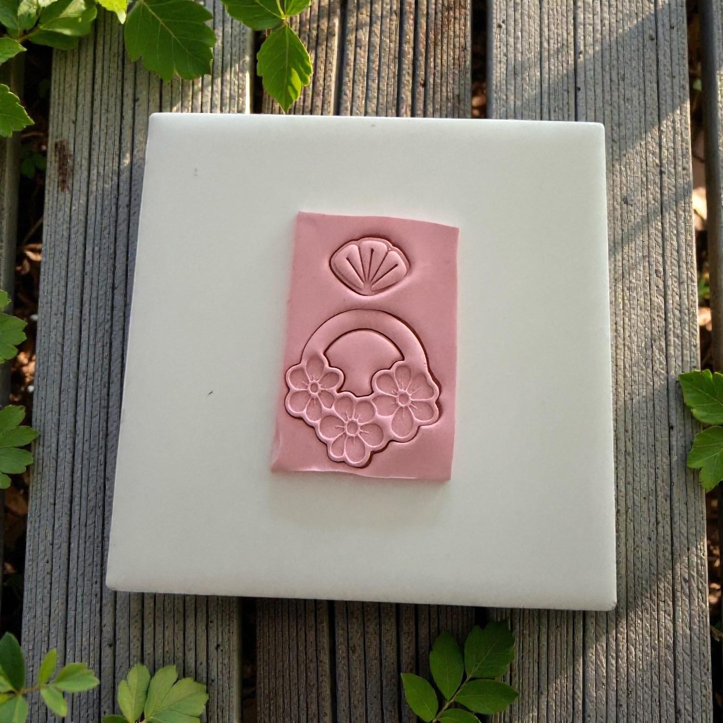 clay slab with floral dangle impression